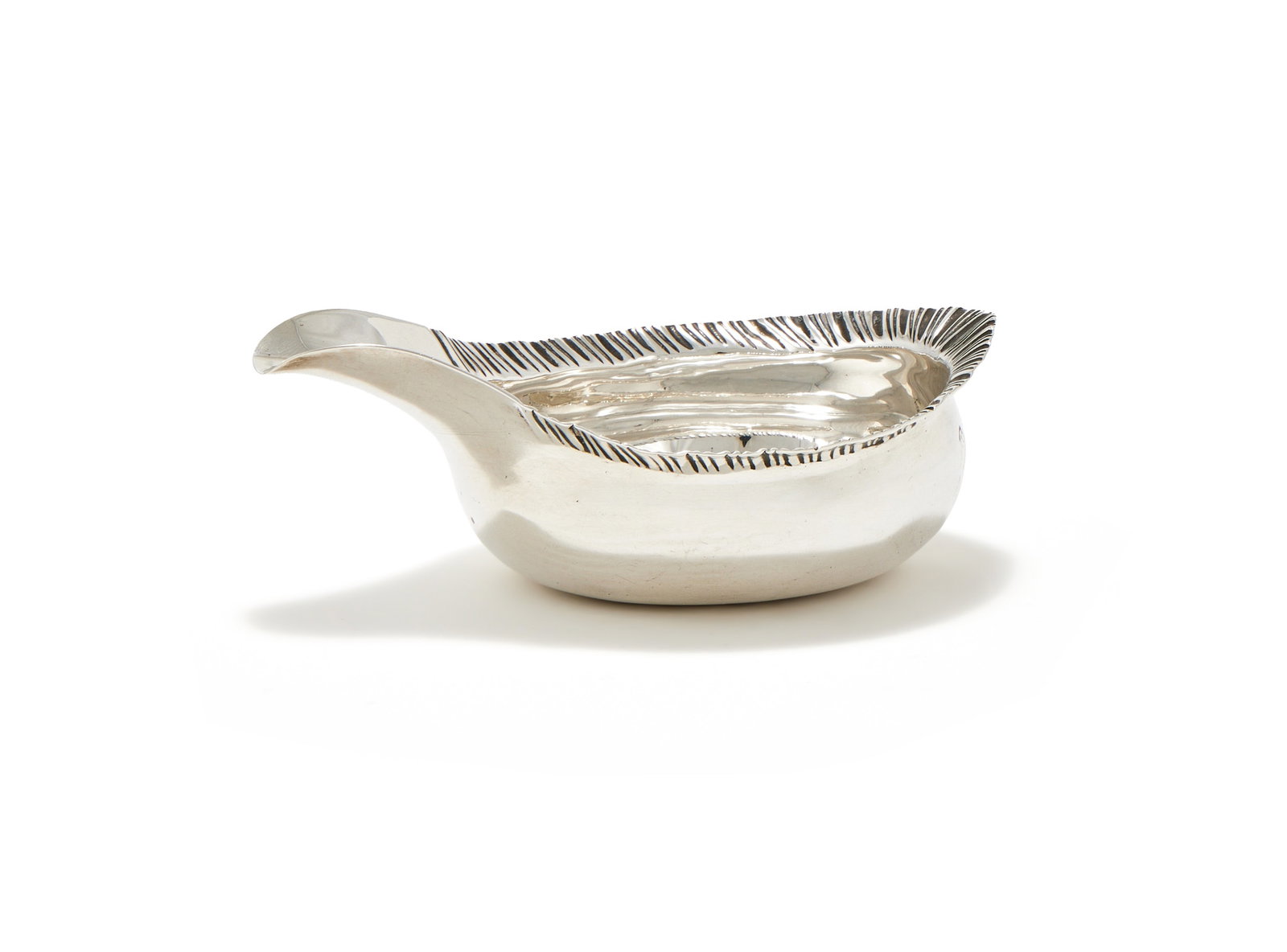 A GEORGE III SILVER PAP BOAT, MAKER'S MARK OBSCURED, POSSIBLY BY HESTER BATEMAN, LONDON 1773: A GEORGE III SILVER PAP BOATMAKER'S MARK OBSCURED, POSSIBLY BY HESTER BATEMAN, LONDON 1773With a feather edge border12cm long69g (2.2 oz)