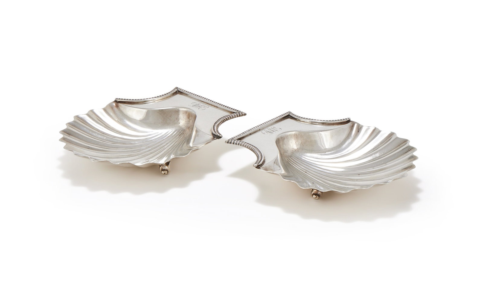 A PAIR OF GEORGE III SILVER SHELL SHAPED BUTTER DISHES, JOHN EMES, LONDON 1807 (1 of 3)