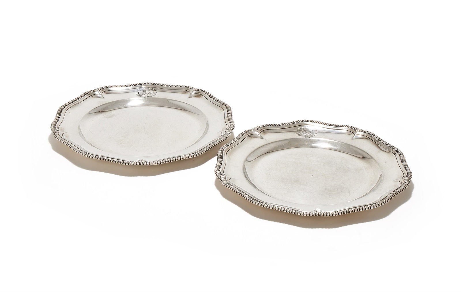 A PAIR OF GEORGE II SILVER SHAPED CIRCULAR PLATES, JOHN HUGH LE SAGE, LONDON 1744 (1 of 3)
