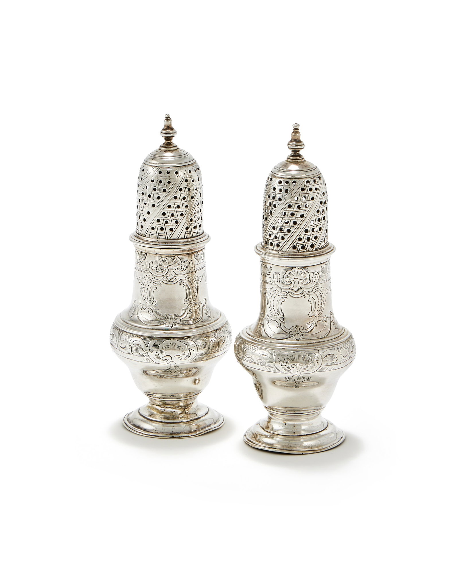 A MATCHED PAIR OF GEORGE III SILVER CASTERS, JOHN DELMESTER AND ROBERT PEASTON (1 of 2)