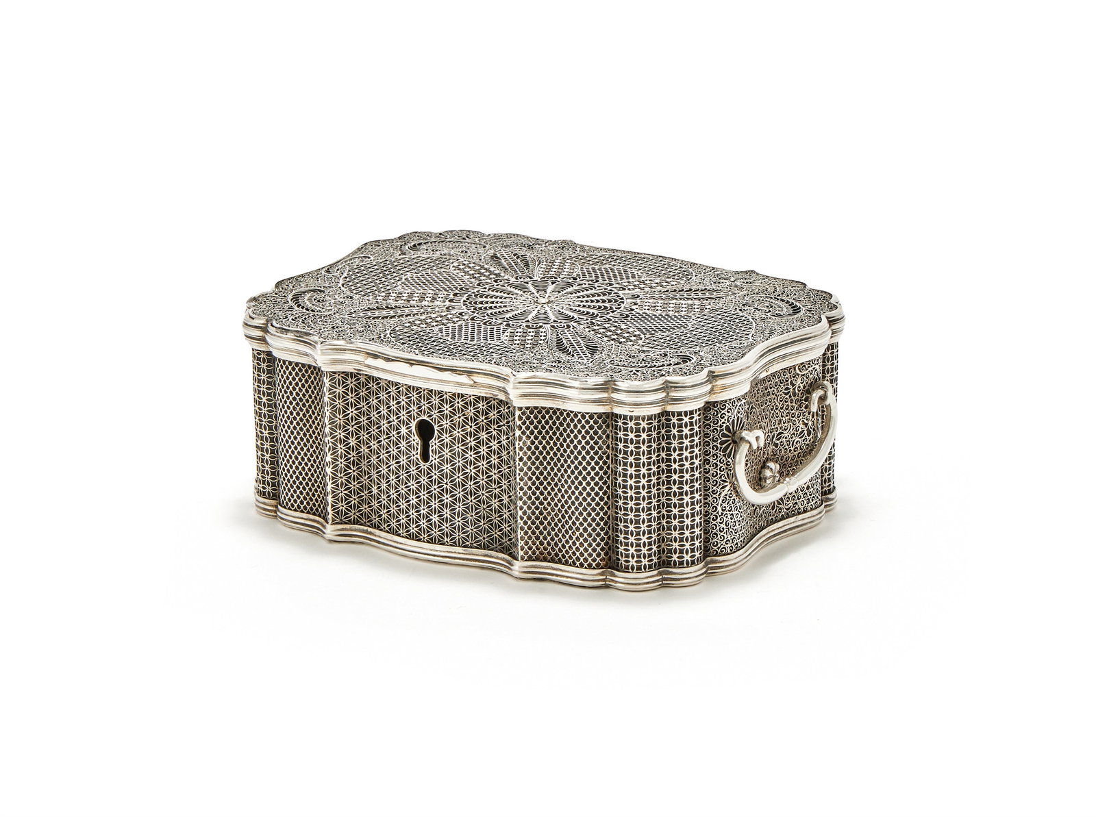 A CHINESE EXPORT SILVER AND PARCEL GILT SHAPED OBLONG FILIGREE BOX, UNMARKED, QING DYNASTY: A CHINESE EXPORT SILVER AND PARCEL GILT SHAPED OBLONG FILIGREE BOXUNMARKED, QING DYNASTY CIRCA 1760With foliate filigree decoration, reeded borders and twin swing loop handles, the cover interior engr