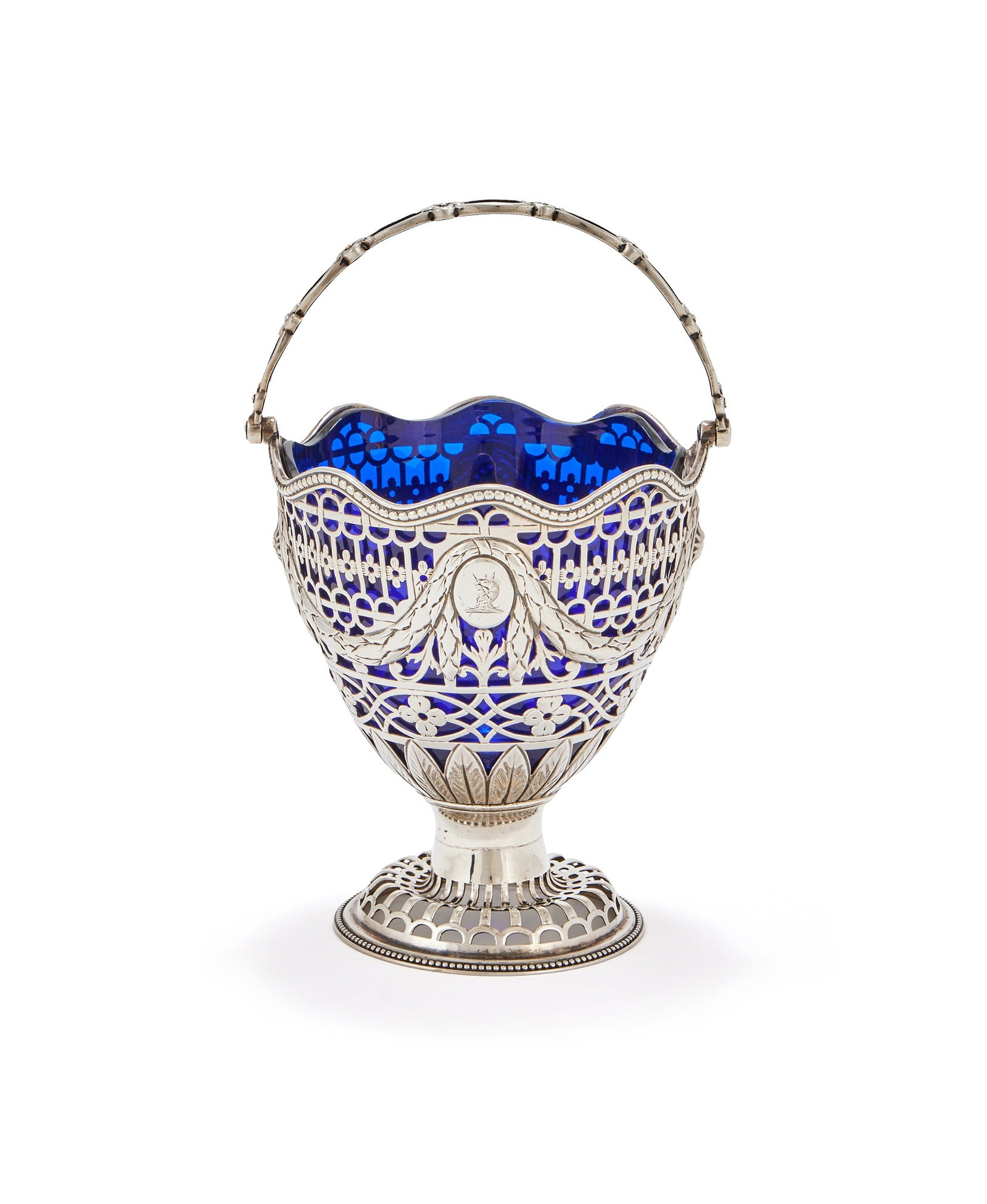 A GEORGE III SILVER SWING HANDLED SUGAR BASKET, WILLIAM PLUMMER, LONDON 1774 (1 of 3)