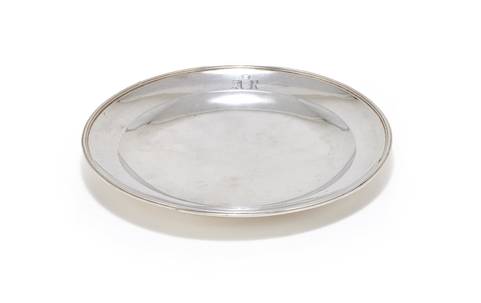 A FRENCH SILVER CIRCULAR PLATE, 1819 - 1973 .950 STANDARD: A FRENCH SILVER CIRCULAR PLATE1819 - 1973 .950 STANDARDEngraved with a coronet over AR19cm diameter177g (5.7 oz)Provenance:From the Collection of Comte Frédéric Chandon de Briailles (1927-20