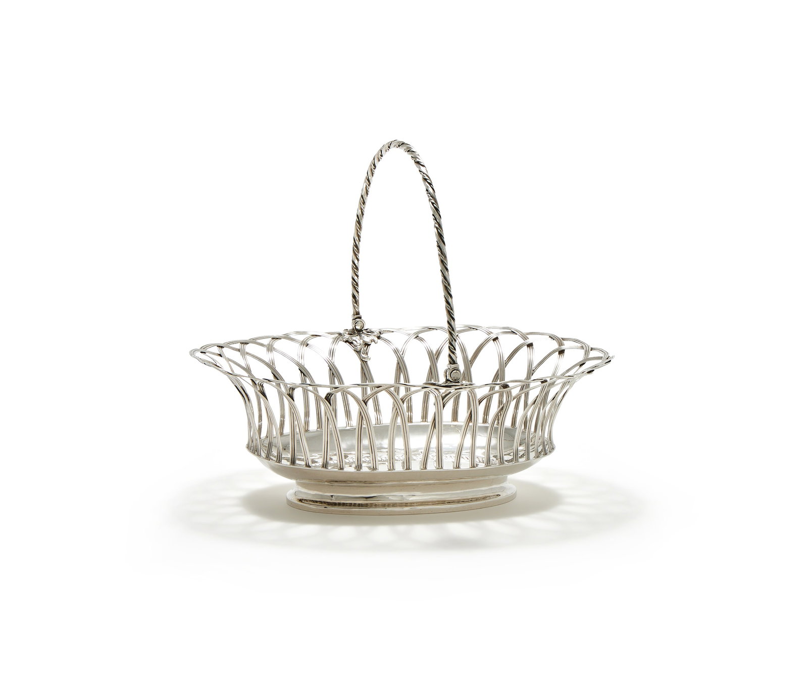 A GEORGE III SILVER OVAL SWING HANDLED BASKET, WILLIAM PLUMMER, LONDON 1782 (1 of 3)
