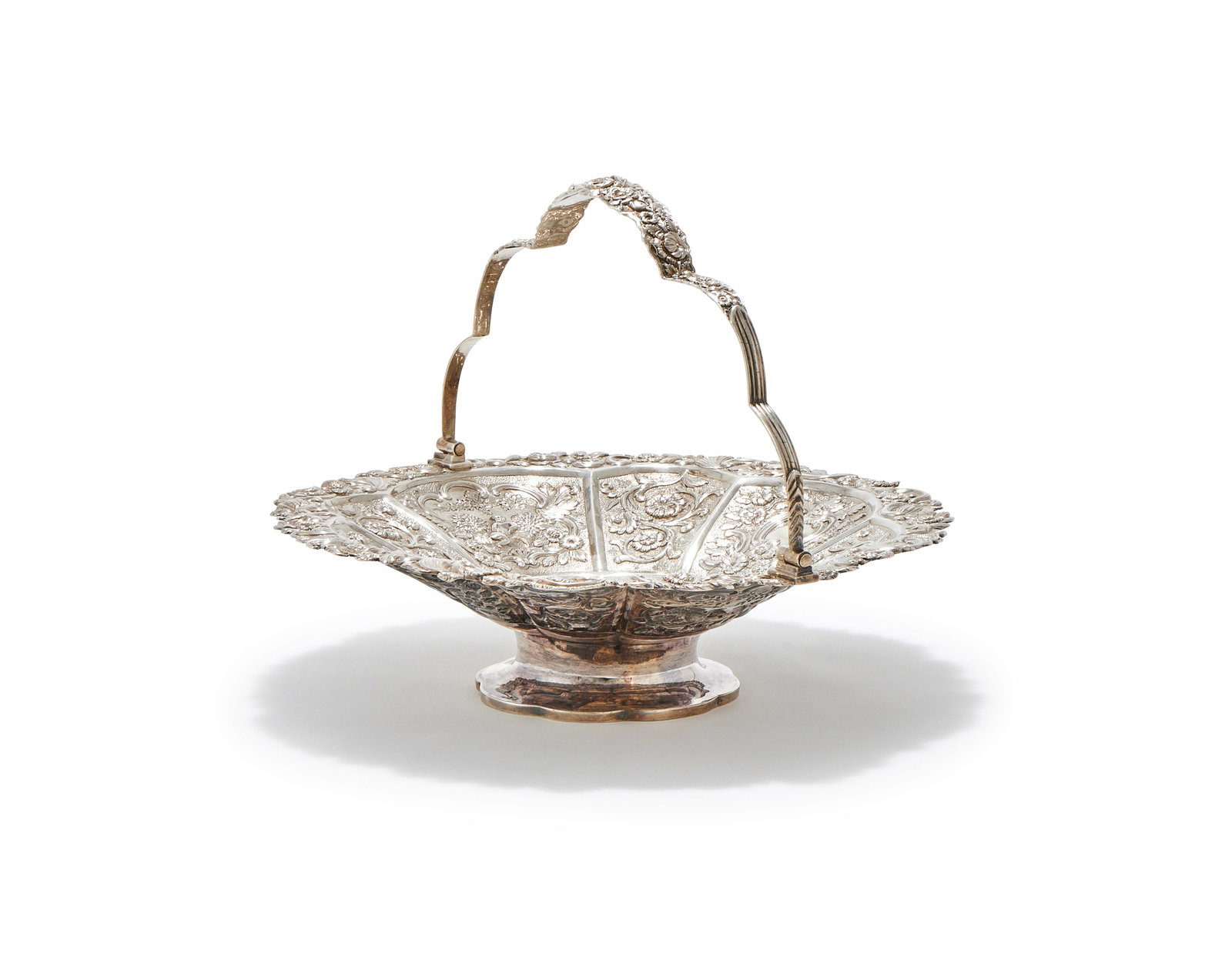 A GEORGE III SILVER SWING HANDLED BASKET, J. E. TERREY & CO., LONDON 1781 (1 of 4)