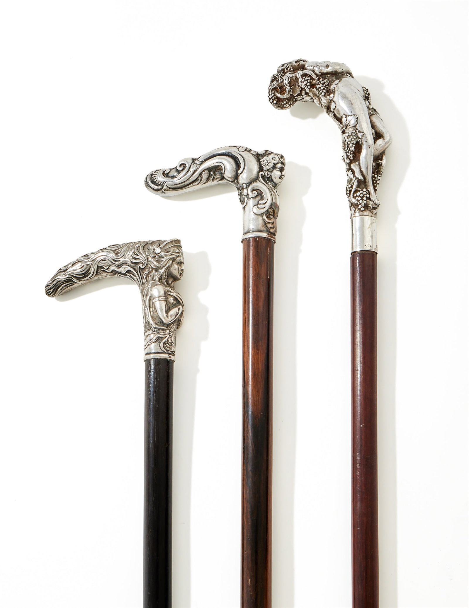 THREE CONTINENTAL SILVER MOUND WALKING STICKS WITH FEMALE FIGURE HANDLES (1 of 4)