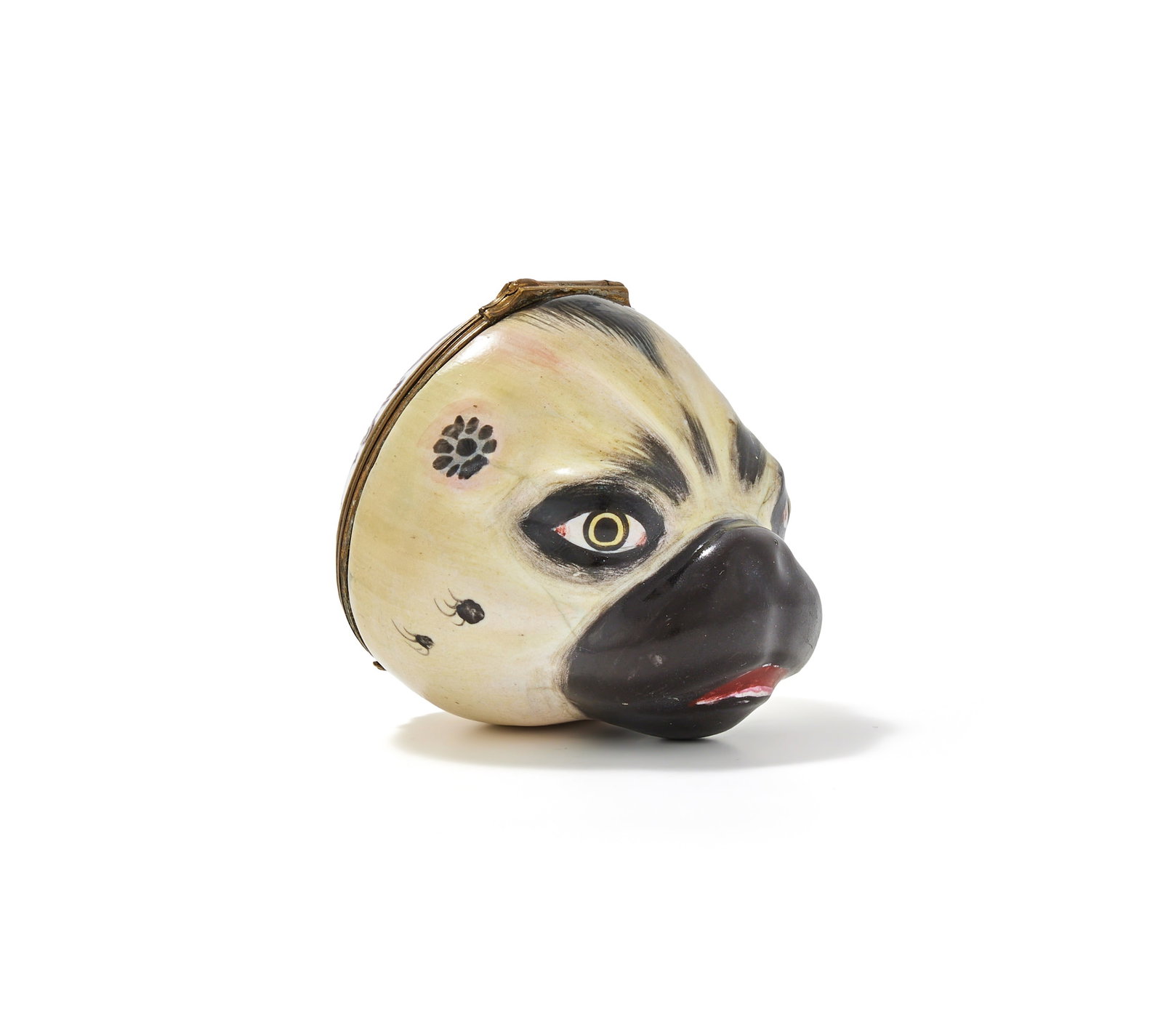 A LARGE ENAMEL PUG DOG SNUFF BOX OR BONBONNIERE, LATE 18TH CENTURY: A LARGE ENAMEL PUG DOG SNUFF BOX OR BONBONNIEREPROBABLY SOUTH STAFFORDSHIRE OR GERMAN, LATE 18TH CENTURYModelled as the head of a pug, its coat light tan and black, the lid painted with a dog seated o