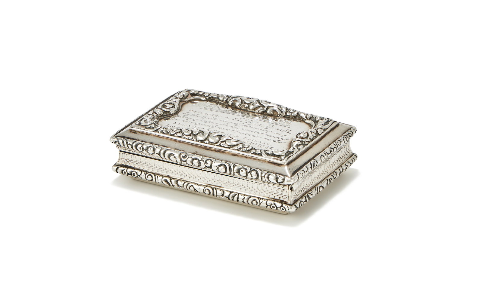 A VICTORIAN SILVER RECTANGULAR SNUFF BOX, NATHANIEL MILLS, BIRMINGHAM 1846: A VICTORIAN SILVER RECTANGULAR SNUFF BOXNATHANIEL MILLS, BIRMINGHAM 1846With engine turned decoration, chased floral and foliate borders, the cover engraved with a train and 'Presented to Mr John Yoxa