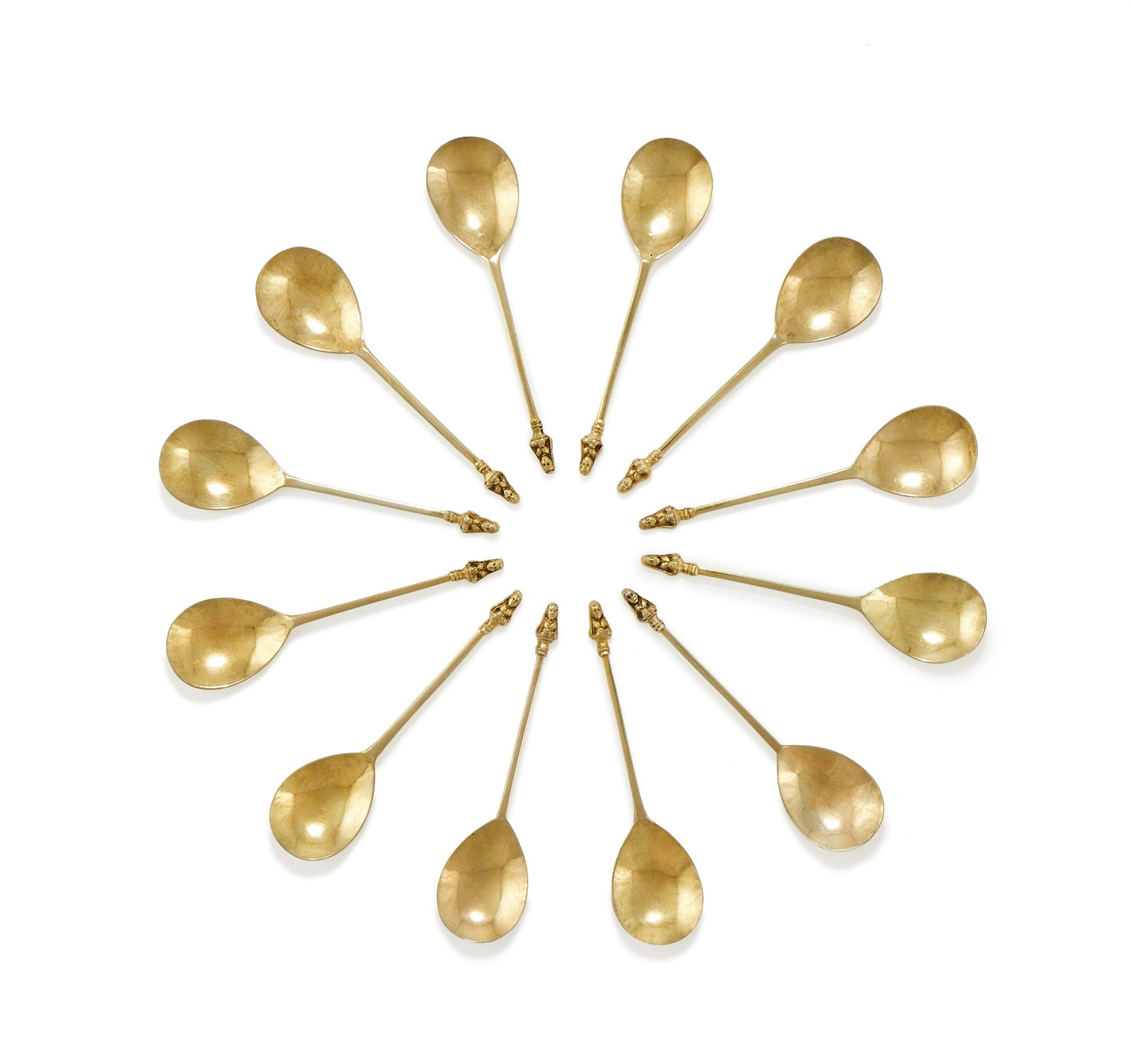 A SET OF TWELVE GEORGE IV SILVER GILT MAIDENHEAD TEASPOONS, EDWARD FARRELL, LONDON 1820: A SET OF TWELVE GEORGE IV SILVER GILT MAIDENHEAD TEASPOONSEDWARD FARRELL, LONDON 1820With maidenhead finials,13cm long250g (8.05 oz)The finials of these spoons are similar to those sold in 1823 by