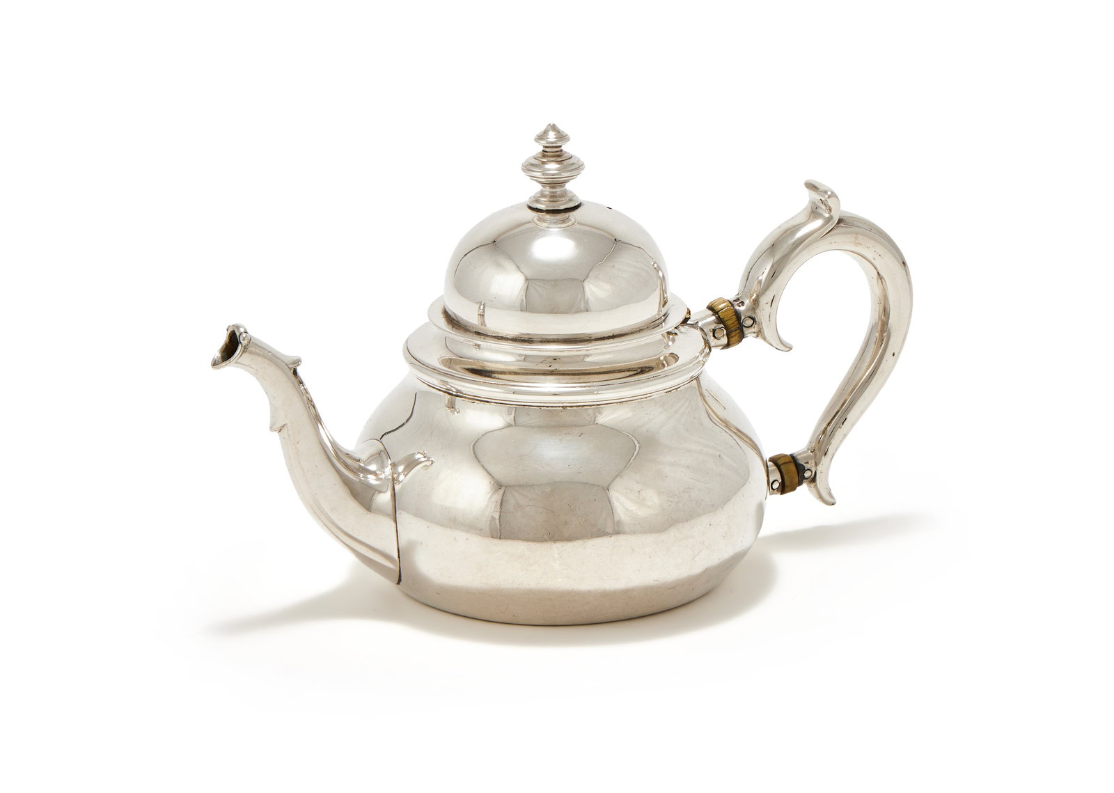 A VICTORIAN SILVER BALUSTER TEAPOT, JOHN SAMUEL HUNT, LONDON 1864: A VICTORIAN SILVER BALUSTER TEAPOTJOHN SAMUEL HUNT, LONDON 1864With a compressed orb finial to the domed cover and a scroll handle with ivory warming bands21cm long423g (13.6 oz) grossPlease note Drew