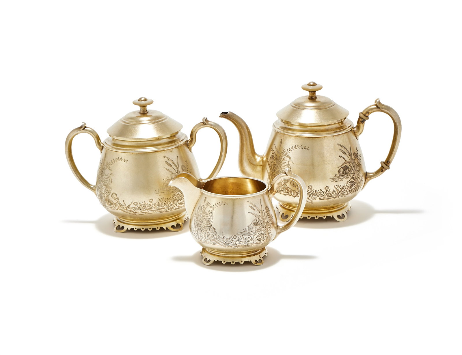 Y A RUSSIAN SILVER GILT THREE PIECE TEA SET, CARL FEBERGÉ, MOSCOW 1893 (1 of 2)