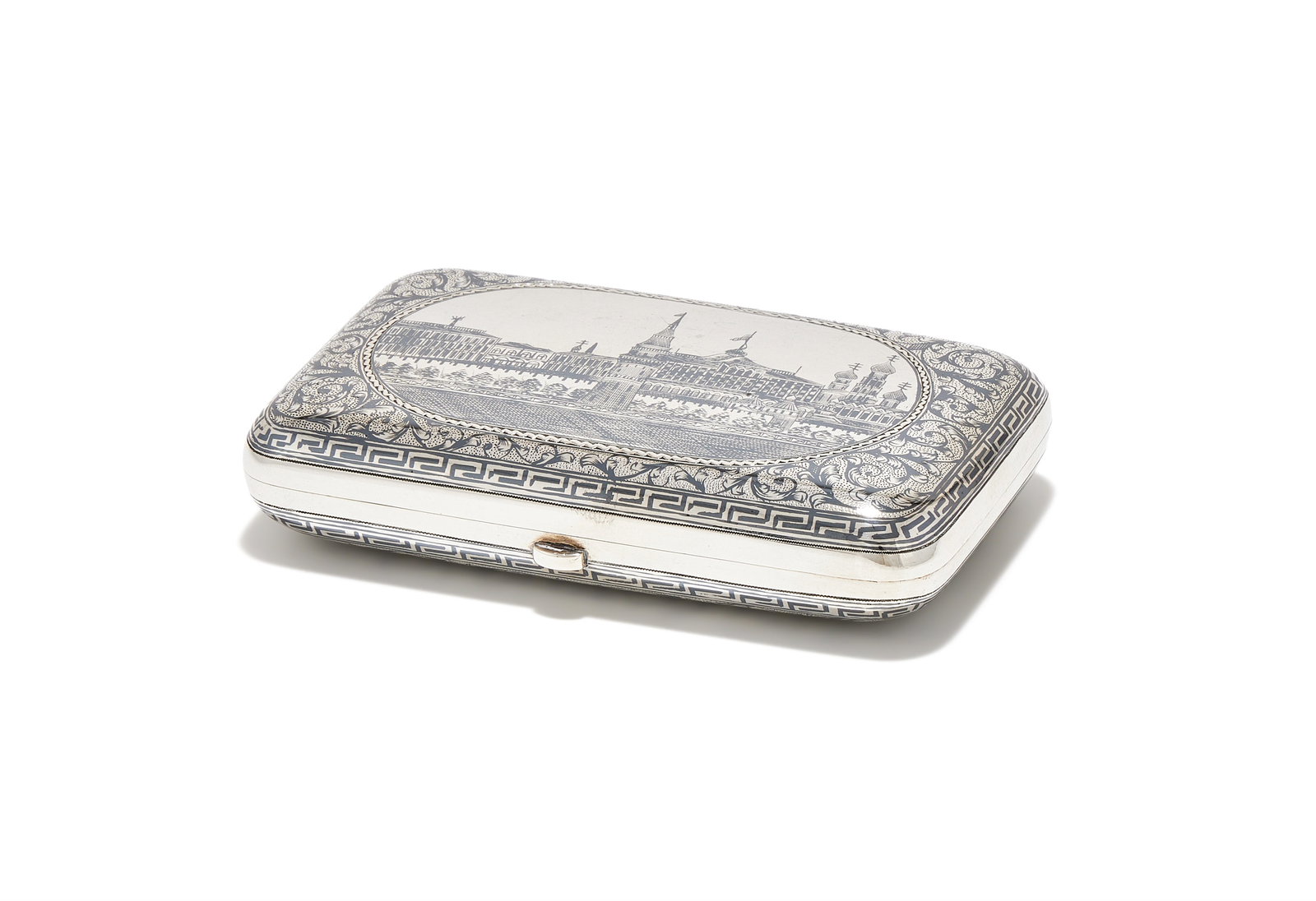A RUSSIAN SILVER AND NIELLO SNUFF BOX, MAKER'S MARK AC, MOSCOW 1891: A RUSSIAN SILVER AND NIELLO SNUFF BOXMAKER'S MARK AC, MOSCOW 1891Depicting the Red Square and the Kremlin within foliate swag and Greek key borders11.5cm long171g (5.5 oz)Provenance:From a Collection 