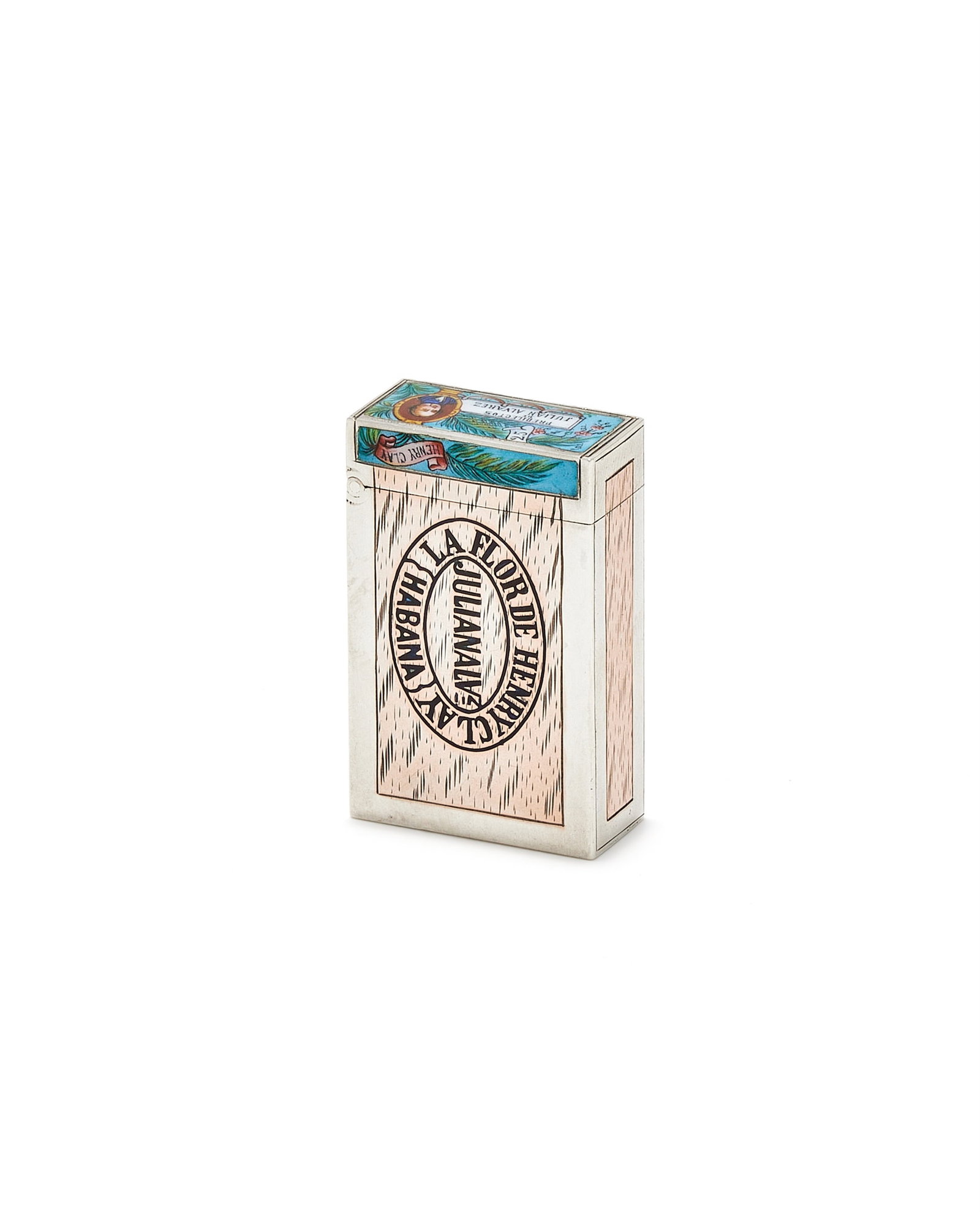 A, CONTINENTAL WHITE METAL AND ENAMEL CIGAR BOX FORM VESTA CASE: ACONTINENTAL WHITE METAL AND ENAMEL CIGAR BOX FORM VESTA CASEUNMARKED, LATE 19TH CENTURYEngraved and enamelled to simulate a cigar box with 'La Flor de Henry Clay, Habana, Julianalvz', the cover ename