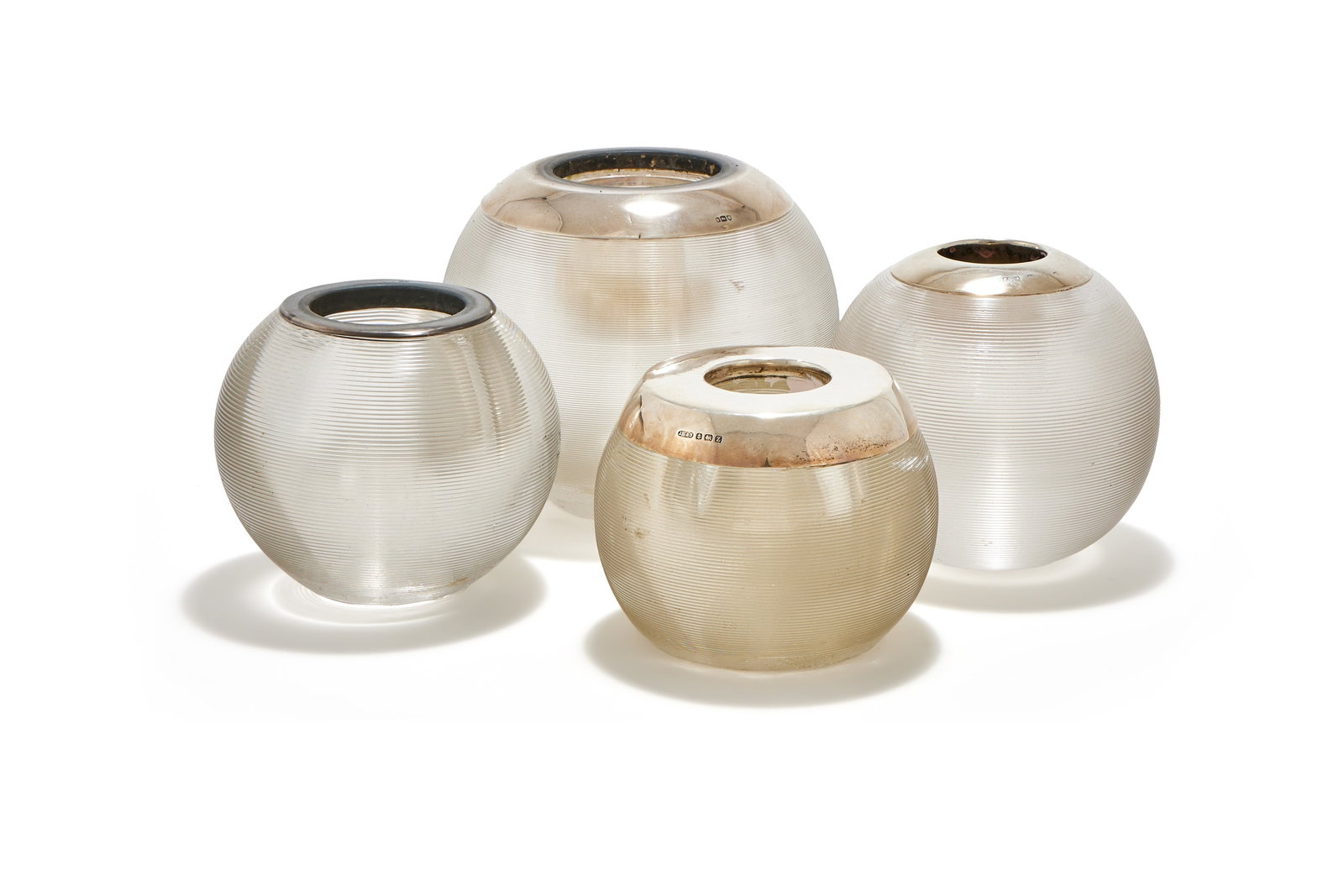 FOUR SILVER MOUNTED AND GLASS GLOBULAR MATCH STRIKERS (1 of 2)