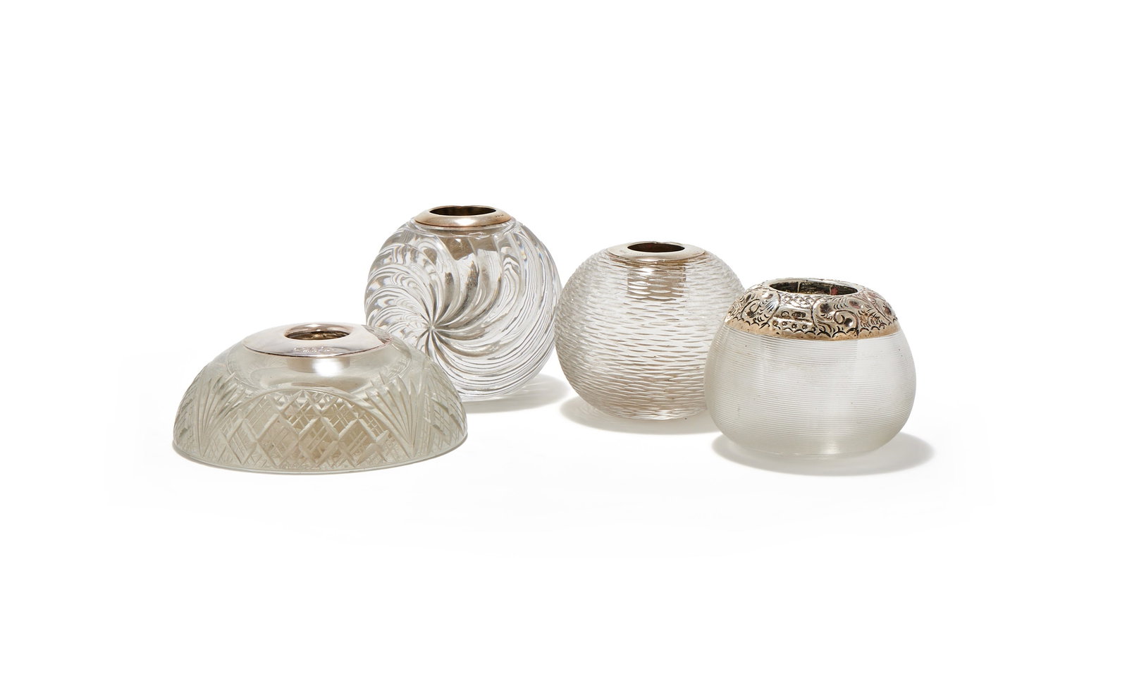 FOUR SILVER MOUNTED AND MOULDED GLASS MATCH STRIKERS (1 of 2)