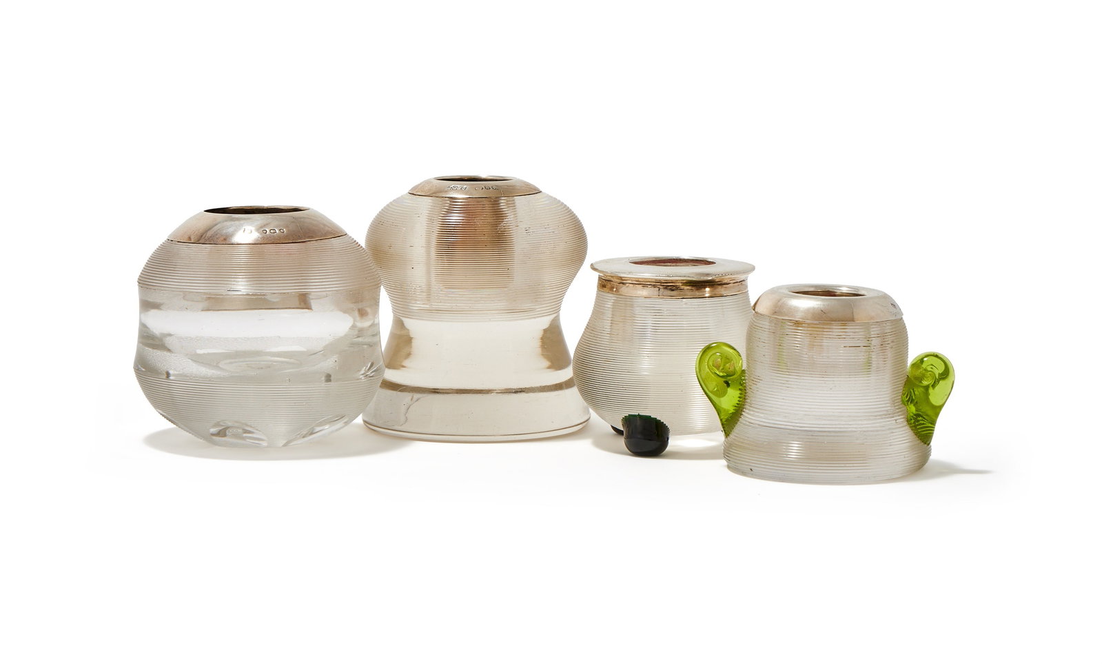 FOUR SILVER MOUNTED AND GLASS MATCH STRIKERS (1 of 2)