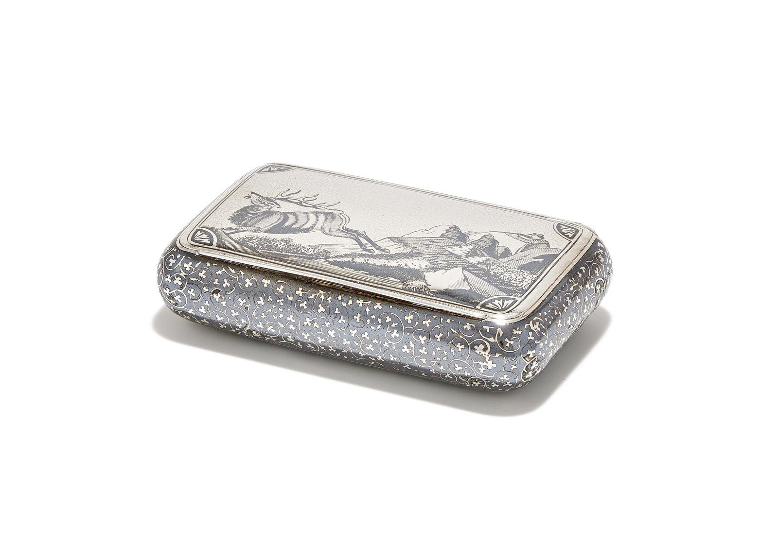 AN AUSTRO HUNGARIAN SILVER AND NIELLO SNUFF BOX, VIENNA 1866 - 1937: AN AUSTRO HUNGARIAN SILVER AND NIELLO SNUFF BOXVIENNA 1866 - 1937The cover depicting a stag hunt, the sides and base with floral and foliate swags10cm long103g (3.3 oz)Provenance:From a Collection of 