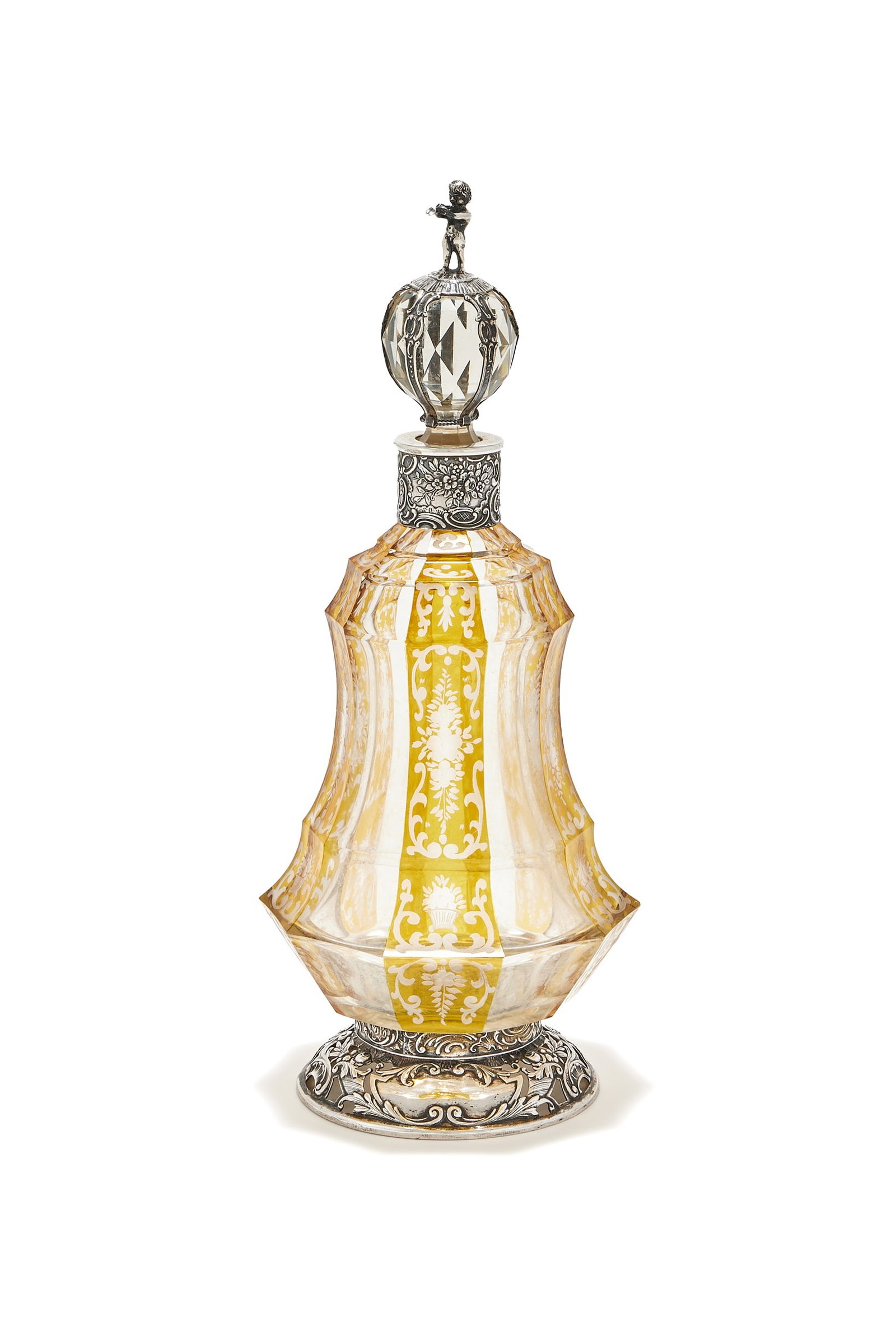 A GERMAN SILVER MOUNTED AND COLOURED GLASS DECANTER, .800 STANDARD, STAMPED GERMANY: A GERMAN SILVER MOUNTED AND COLOURED GLASS DECANTER.800 STANDARD, STAMPED GERMANYWith a putto playing a flute finial to the faceted ball stopper, the collar chased with C-scrolls, flowers and lattice 