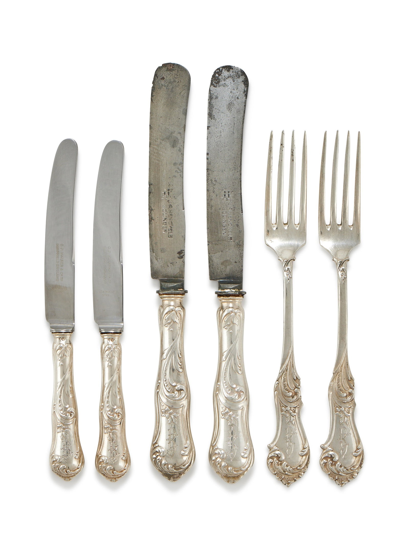 A GERMAN SILVER PART TABLE SERVICE, E. MARCUS, POST 1886 .800 STANDARD, BERLIN CIRCA 1910: A GERMAN SILVER PART TABLE SERVICEE. MARCUS, POST 1886 .800 STANDARD, BERLIN CIRCA 1910Engraved G, comprising:Eighteen table forks1367g (43.95 oz)Together with the following silver handled knives:Eigh
