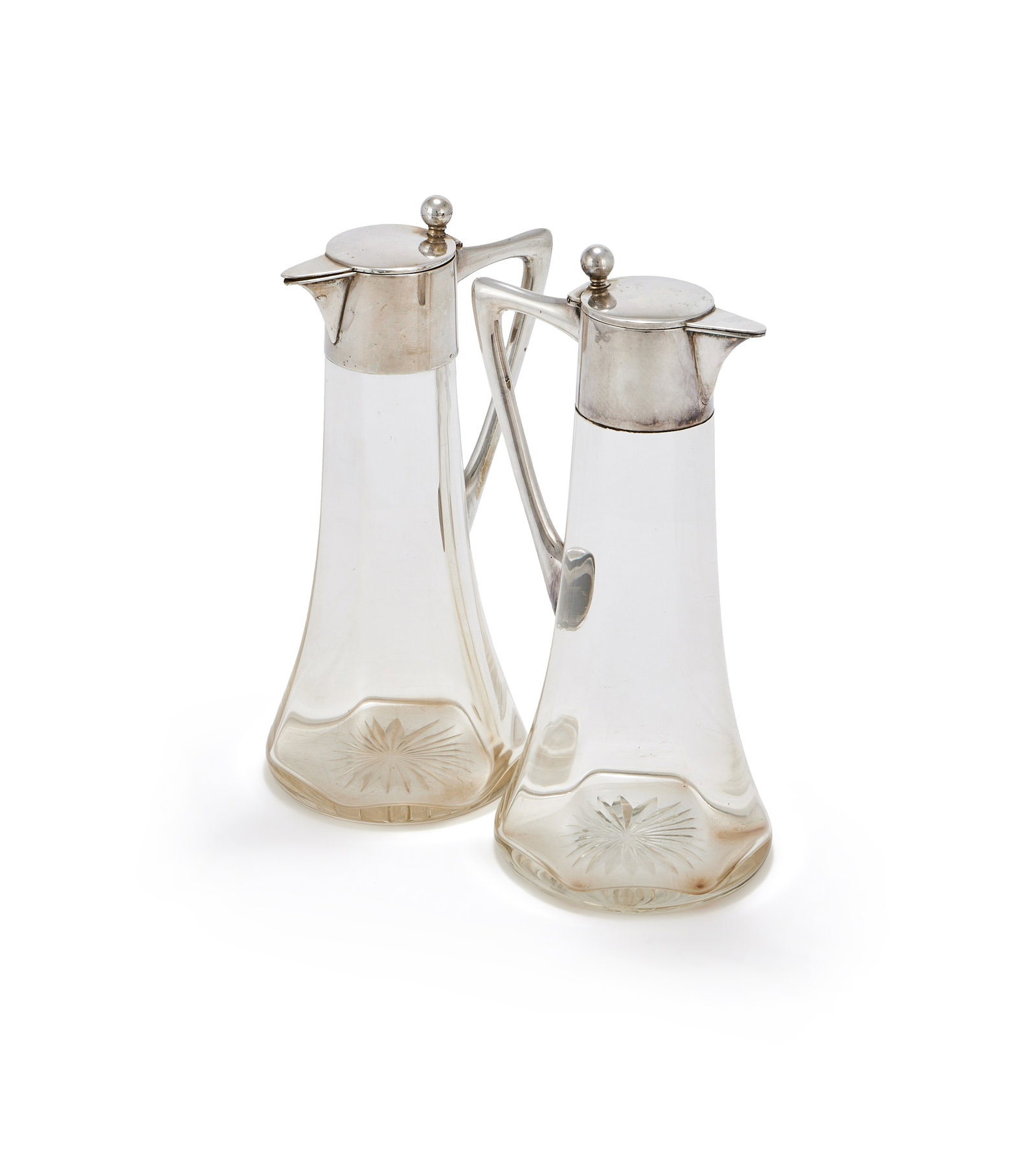 A PAIR OF GERMAN SILVER MOUNTED AND GLASS CLARET JUGS, WILHELM BINDER, SCHWÄBISCH GMÜND (1 of 2)