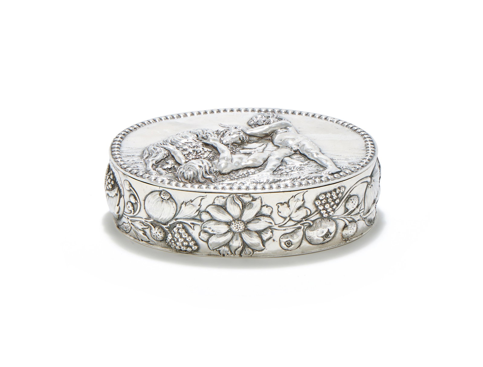 A GERMAN SILVER OVAL BOX, KARL KURZ, KESSELSTADT, IMPORT MARK FOR LONDON 1902: A GERMAN SILVER OVAL BOXKARL KURZ, KESSELSTADT, SPONSOR'S MARK FOR THEODOR HARTMANN, IMPORT MARK FOR LONDON 1902The cover with a beaded border and chased with two putto and a goat, the body with a ban