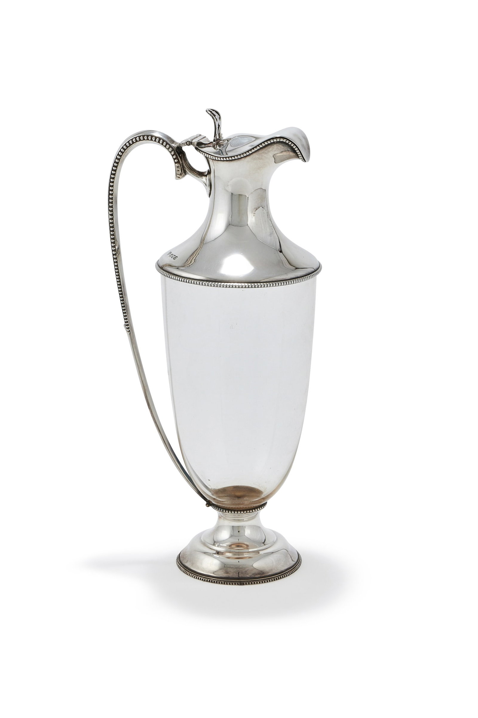 AN EDWARDIAN SILVER MOUNTED AND GLASS CLARET JUG, GOLDSMITHS & SILVERSMITHS CO. LTD., LONDON 1909 (1 of 2)