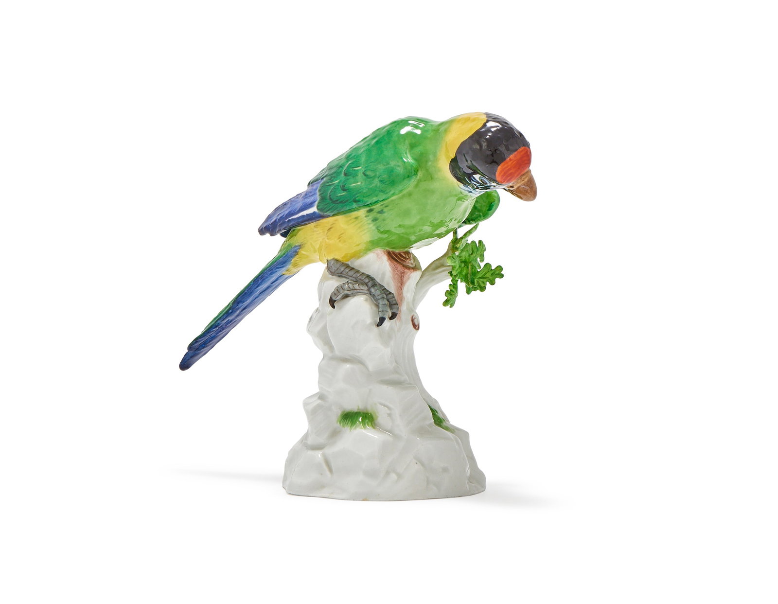 A MEISSEN MODEL OF A PARROT, BLUE CROSSED SWORDS MARKS, LATE 19TH CENTURY: A MEISSEN MODEL OF A PARROTBLUE CROSSED SWORDS MARKS, LATE 19TH CENTURYModelled perched on a stump19cm high