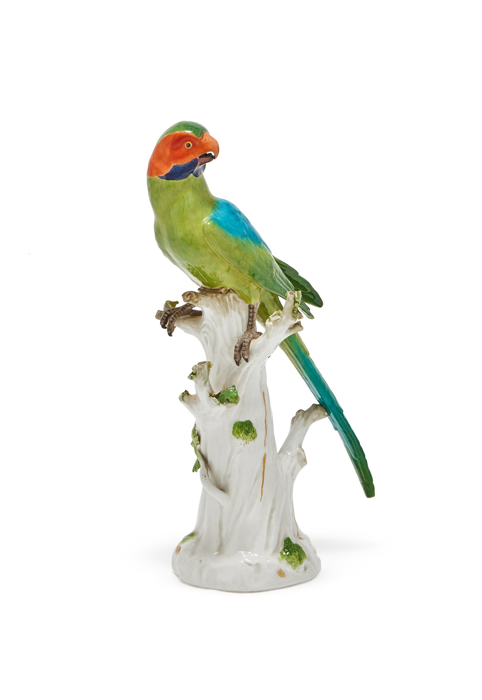 A MEISSEN MODEL OF A PARAKEET, BLUE CROSSED SWORDS MARKS, LATE 19TH CENTURY: A MEISSEN MODEL OF A PARAKEETBLUE CROSSED SWORDS MARKS, LATE 19TH CENTURYModelled perched on a stump31cm high (chips & losses to foliage)