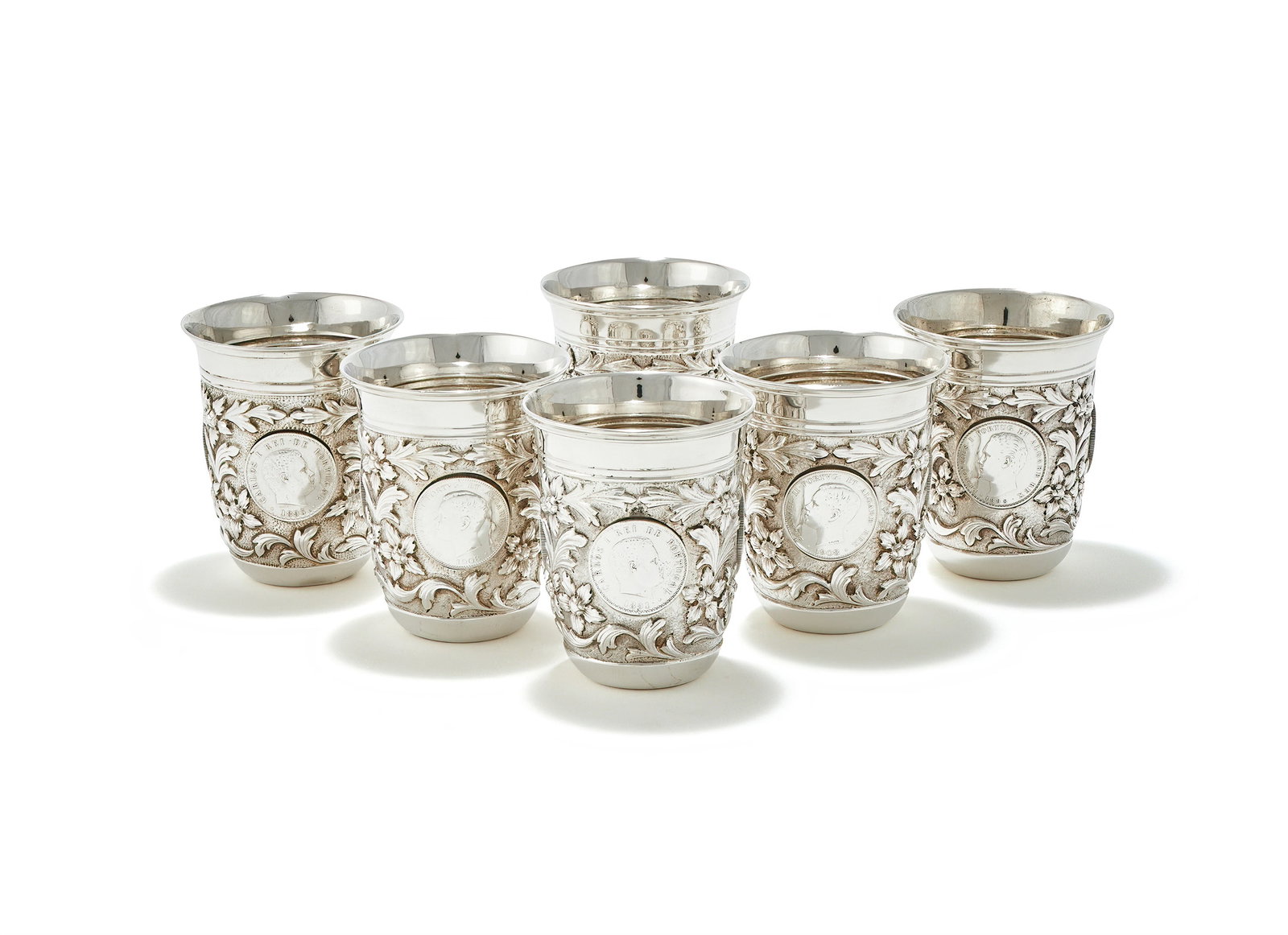 A SET OF SIX PORTUGUESE SILVER TUMBLER CUPS INSET WITH COINS, MERGULHAO, LISBON (1 of 3)