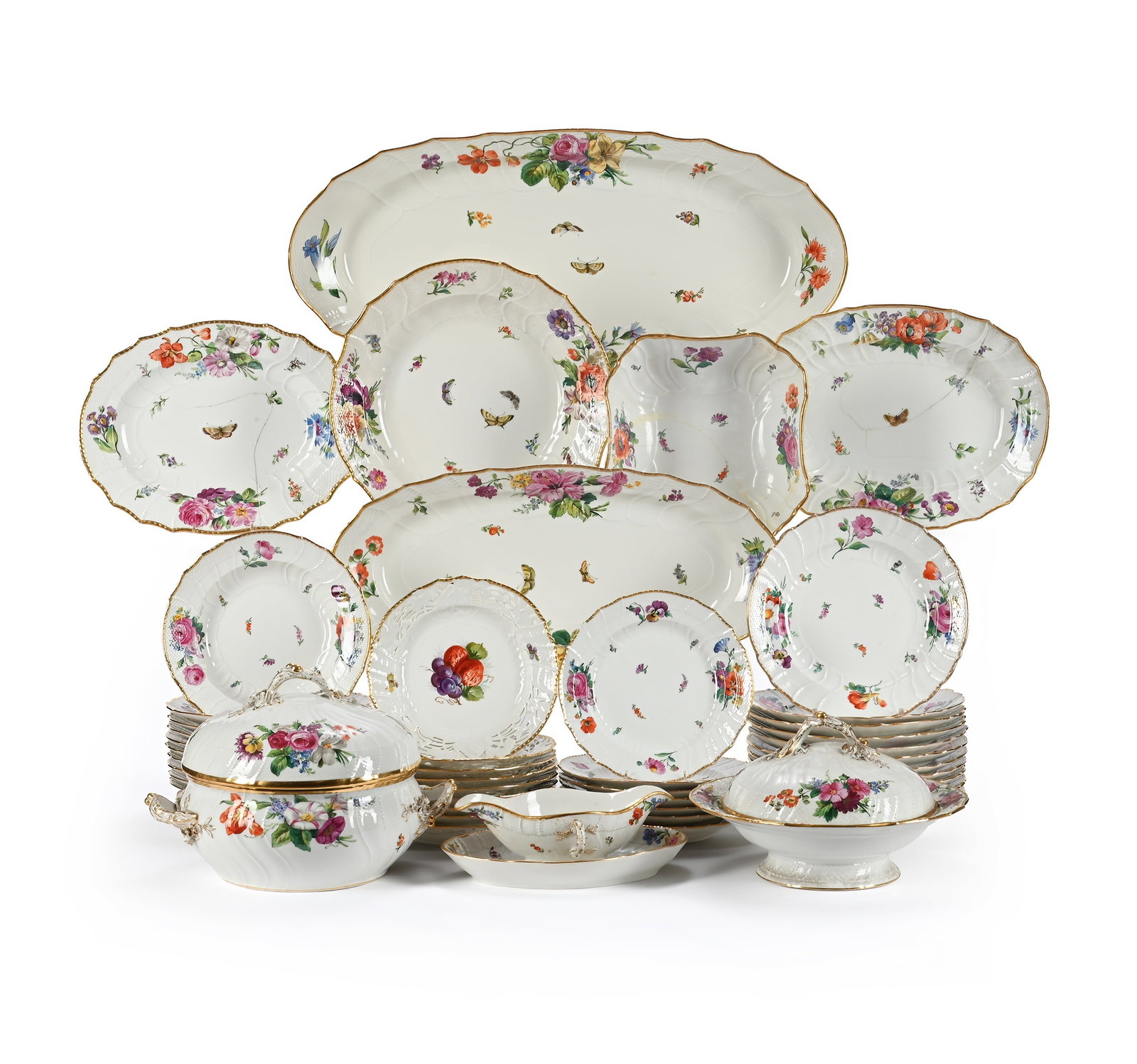 A BERLIN KPM PORCELAIN PART DINNER SERVICE, LATE 20TH CENTURY: A BERLIN KPM PORCELAIN PART DINNER SERVICEOUTSIDE DECORATED, LATE 20TH CENTURYEach piece decorated with flowers and butterflies with neuosier moulded borders, comprising:A soup tureen, cover and stand