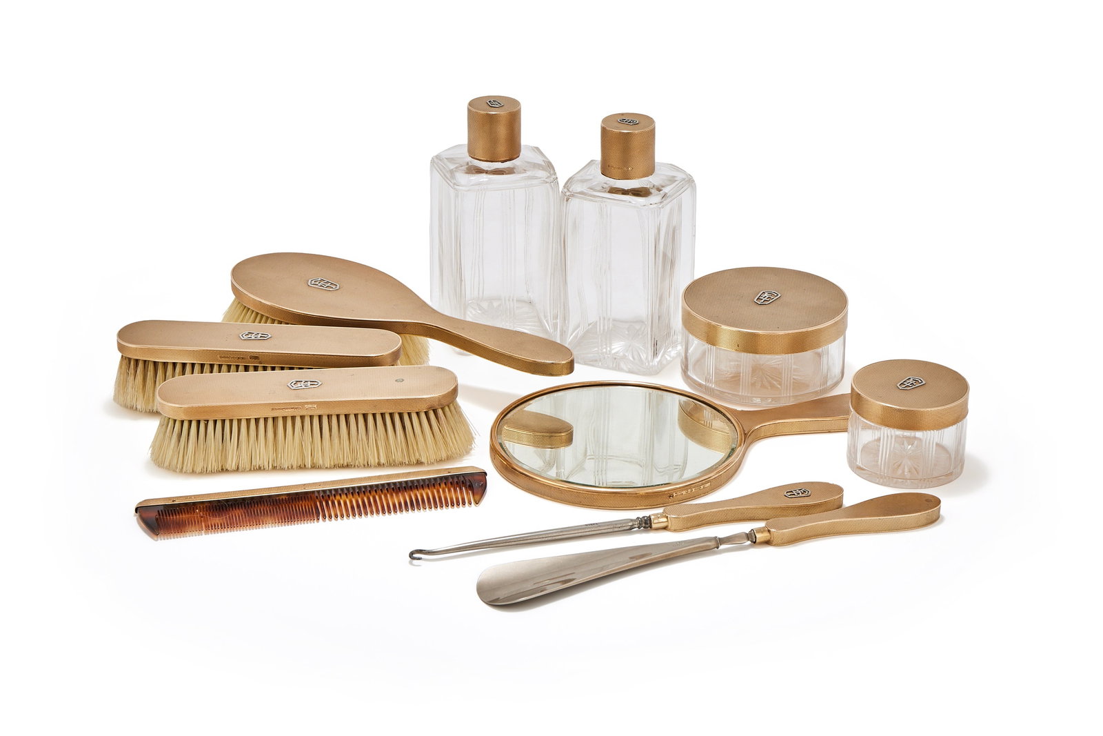 Y ASPREY & CO. LTD., A 9 CARAT GOLD MOUNTED ELEVEN PIECE DRESSING TABLE SET, LONDON 1930 (1 of 2)