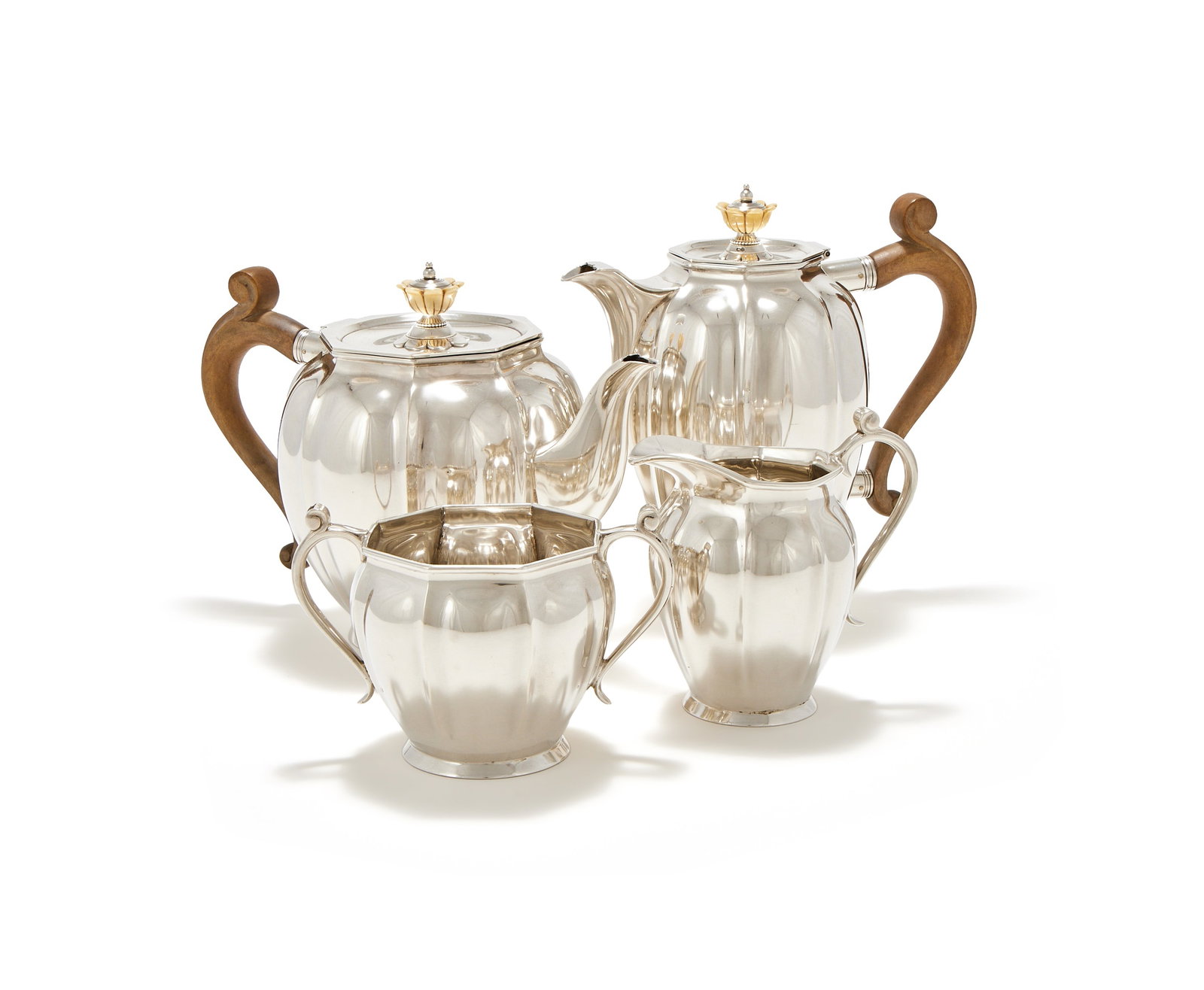 A SILVER FOUR PIECE LOBED CIRCULAR TEA SET, ROBERTS & BELK LTD., SHEFFIELD 1948 (1 of 2)