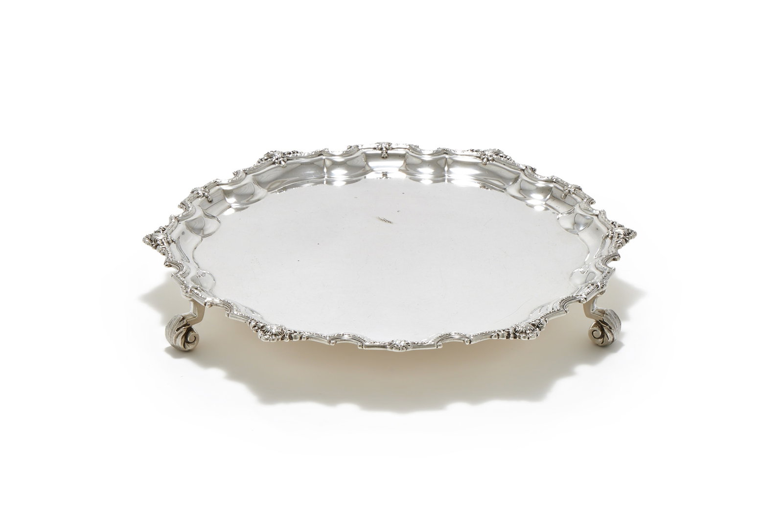 A SILVER SHAPED CIRCULAR SALVER, ADIE BROTHERS LTD., BIRMINGHAM 1945 (1 of 2)