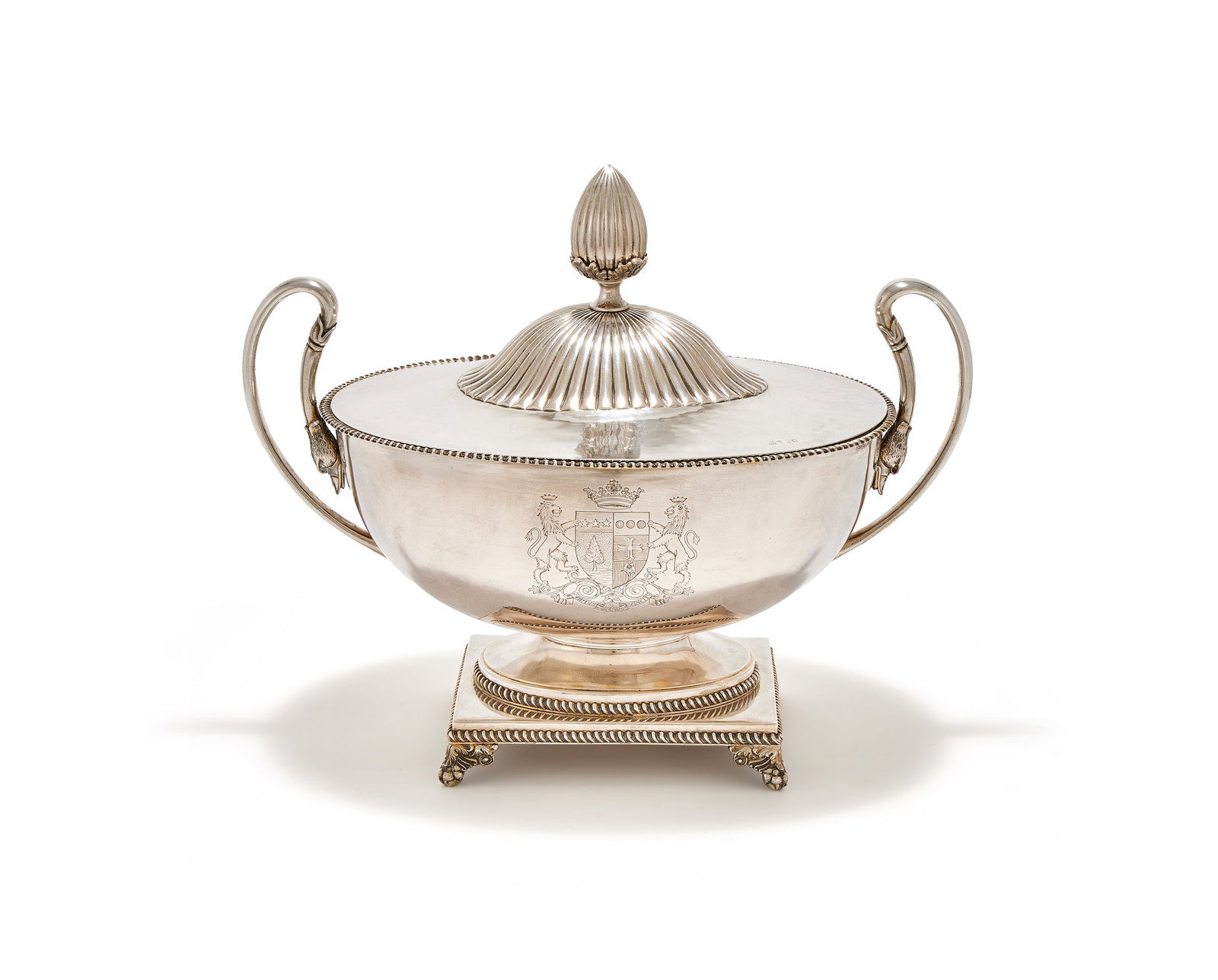 A SILVER COLOURED TUREEN AND COVER, POSSIBLY ITALIAN, SECOND HALF 20TH CENTURY, SPURIOUS MARKS: A SILVER COLOURED TUREEN AND COVERPOSSIBLY ITALIAN, SECOND HALF 20TH CENTURY, SPURIOUS MARKSWith a bud finial to the lobed domed cover, the body with a gadrooned border, twin swan scroll handles, engr