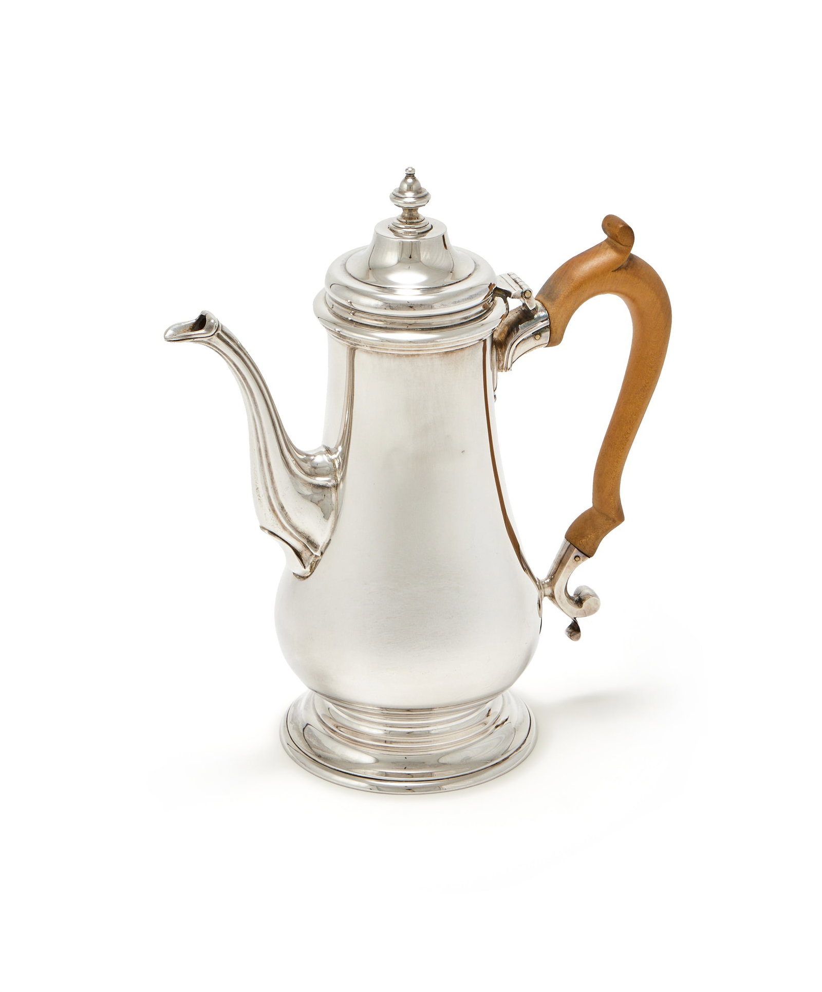 A SILVER BALUSTER COFFEE POT, J. PARKES & CO., LONDON 1964: A SILVER BALUSTER COFFEE POTJ. PARKES & CO., LONDON 1964With a bell shaped finial to the domed cover, a wood double scroll handle and on a circular spreading foot23.5cm high748g (24.05 oz) gross