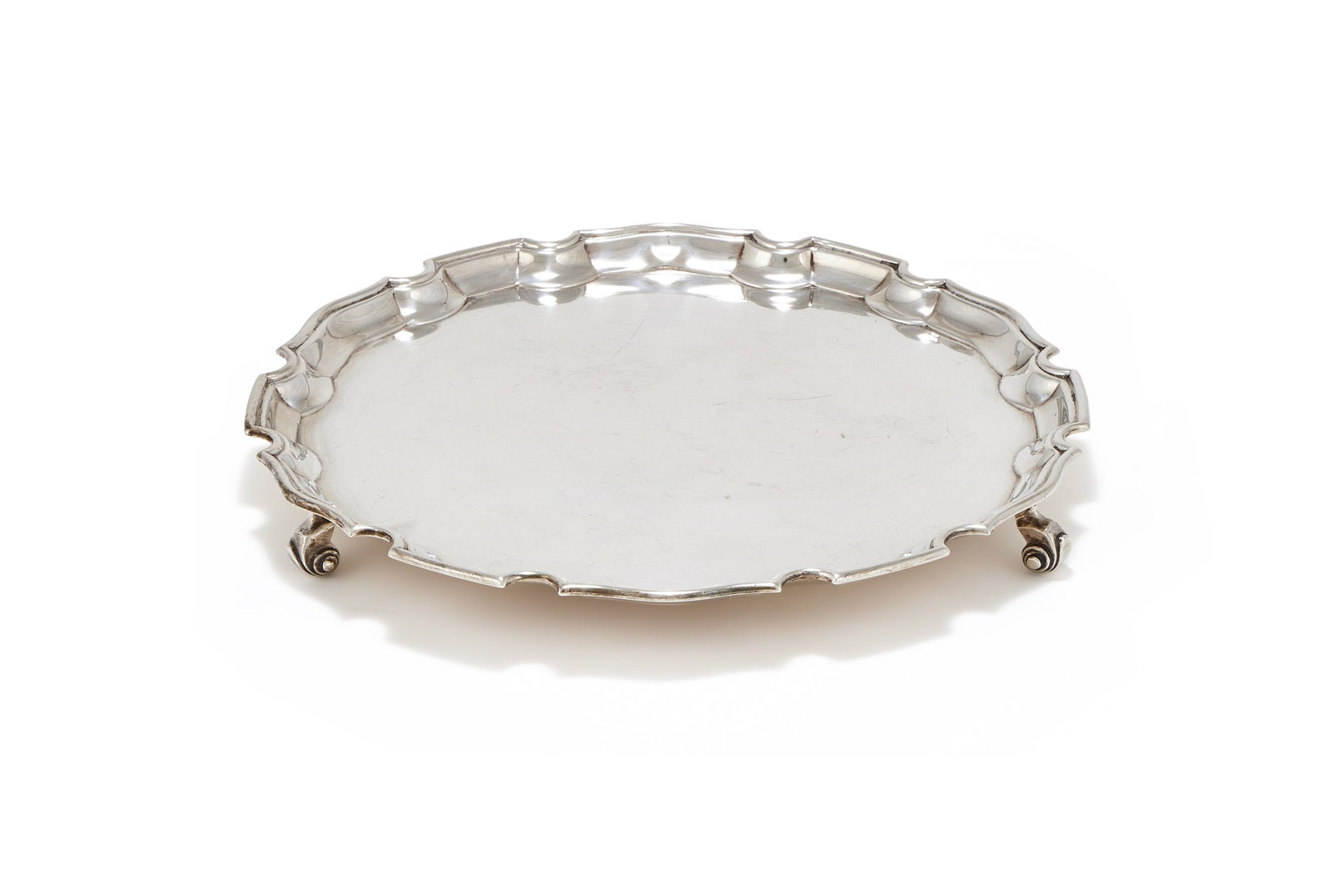 A SILVER SHAPED CIRCULAR SALVER, C. J. VANDER LTD., LONDON 1958 (1 of 2)