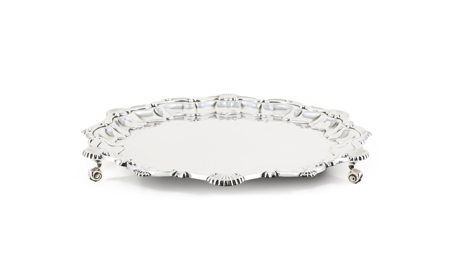A SILVER SHAPED CIRCULAR SALVER, CAVALIER TABLEWARE, BIRMINGHAM 1976 (1 of 3)