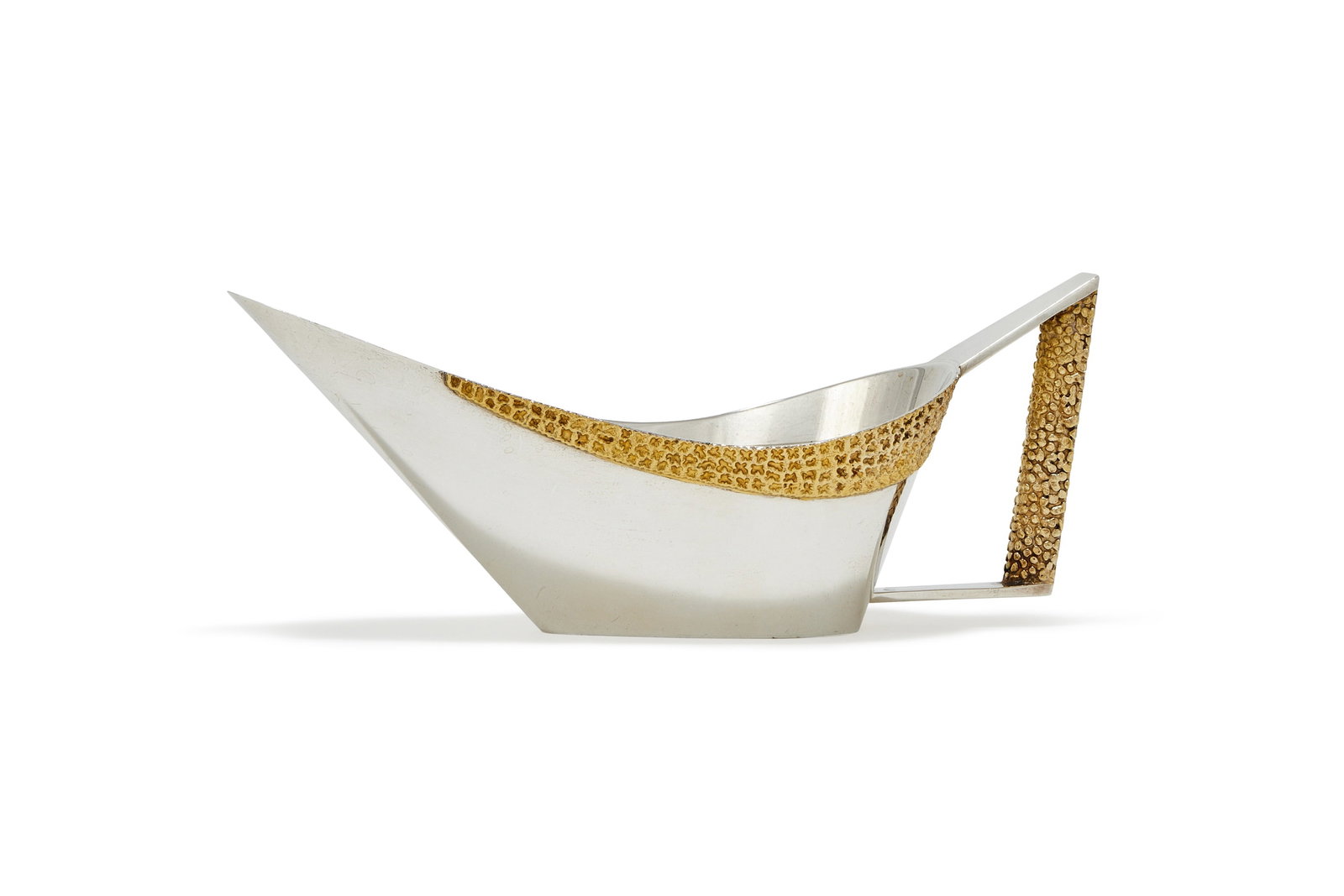 STUART DEVLIN, A SILVER AND SILVER GILT SAUCEBOAT, LONDON 1973 (1 of 2)