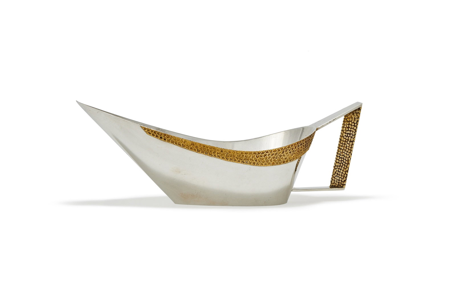 STUART DEVLIN, A SILVER AND SILVER GILT SAUCEBOAT, LONDON 1973 (1 of 2)