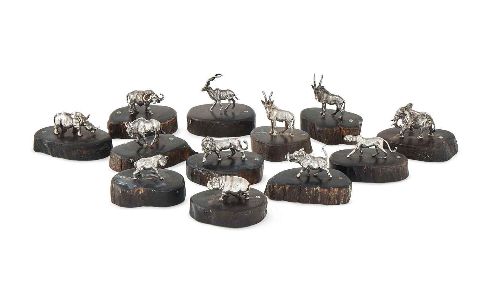 PATRICK MAVROS, TWELVE SILVER MODELS OF ANIMALS, ZIMBABWE, MODERN: PATRICK MAVROS, TWELVE SILVER MODELS OF ANIMALSZIMBABWE, MODERNEach mounted on an ebonized baseThe bases from 5cm to 6.5cm long