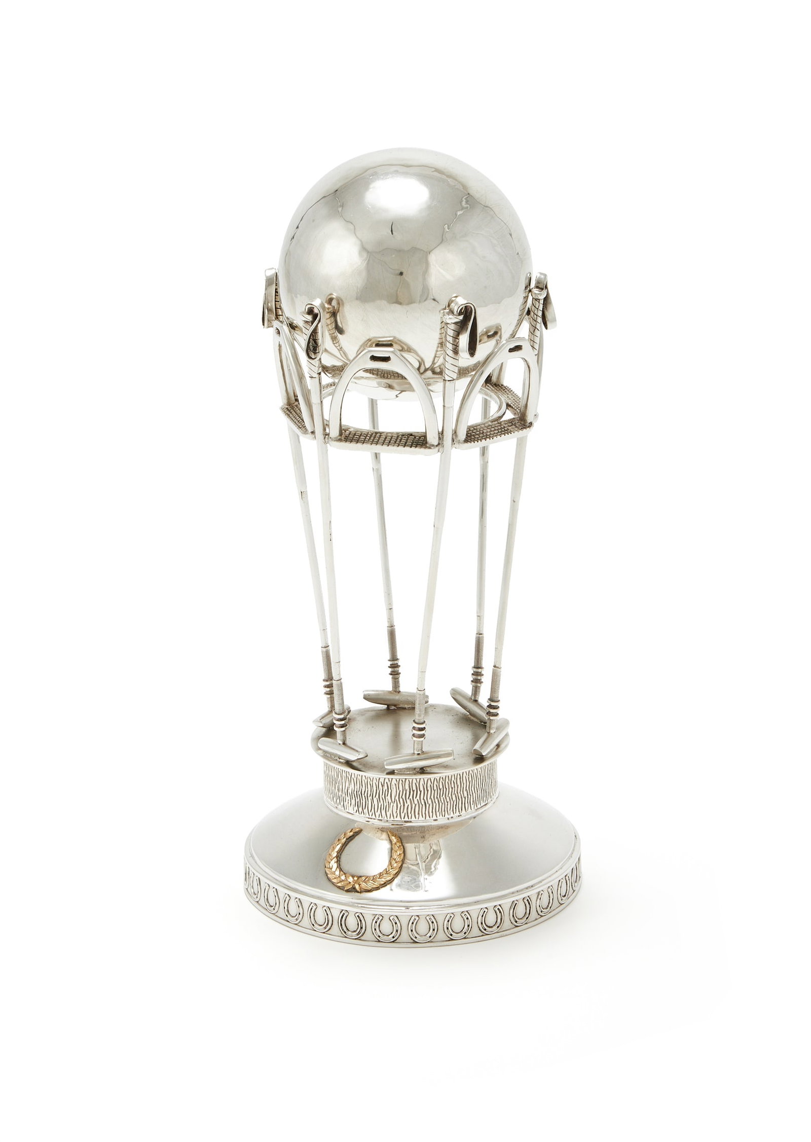 A SILVER POLO TROPHY, UNMARKED, MODERN: A SILVER POLO TROPHYUNMARKED, MODERNFormed as a polo ball being held aloft by stirrups and mallets, the circular domed base applied with a laurel wreath and a band of horseshoes 23cm high686g (22.05 o