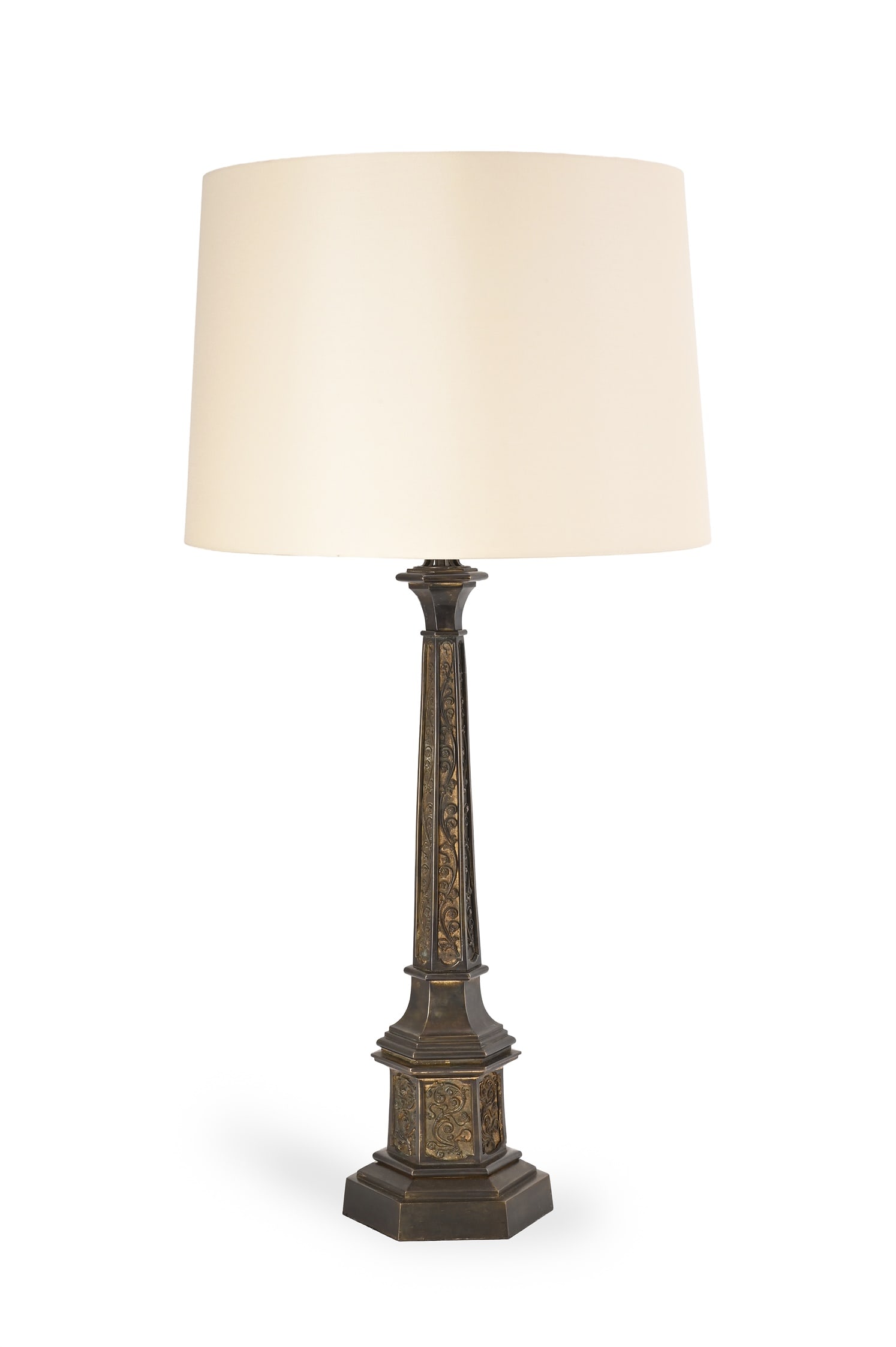 A LARGE LATE REGENCY GILT AND PATINATED BRONZE 'GOTHIC' TABLE LIGHT, EARLY 19TH CENTURY: A LARGE LATE REGENCY GILT AND PATINATED BRONZE 'GOTHIC' TABLE LIGHTEARLY 19TH CENTURYOf swept triform, with floral inset panels, later fitted for electricity, with new cream silk shadebase 57cm high e