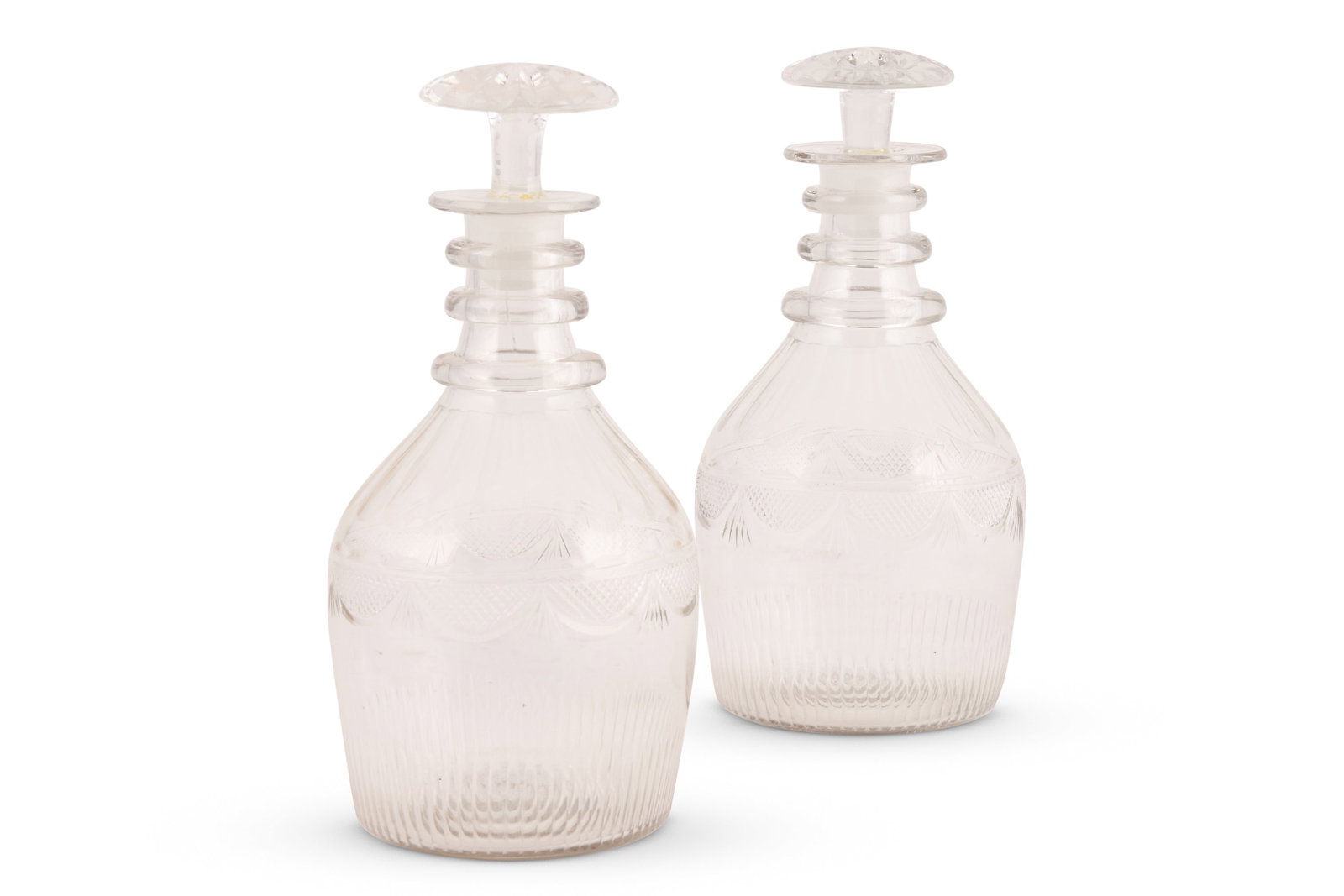 A PAIR OF IRISH CUT-GLASS MALLET-SHAPED DECANTERS AND STOPPERS, CIRCA 1800 (1 of 2)