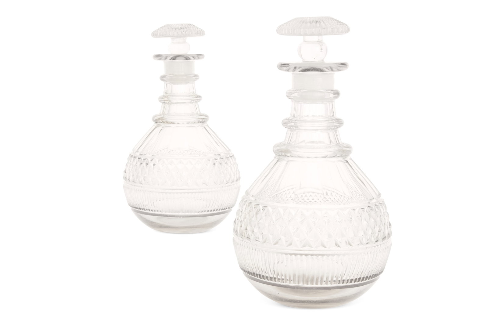 A PAIR OF CUT-GLASS CLUB-SHAPED DECANTERS AND STOPPERS, CIRCA 1825 (1 of 2)