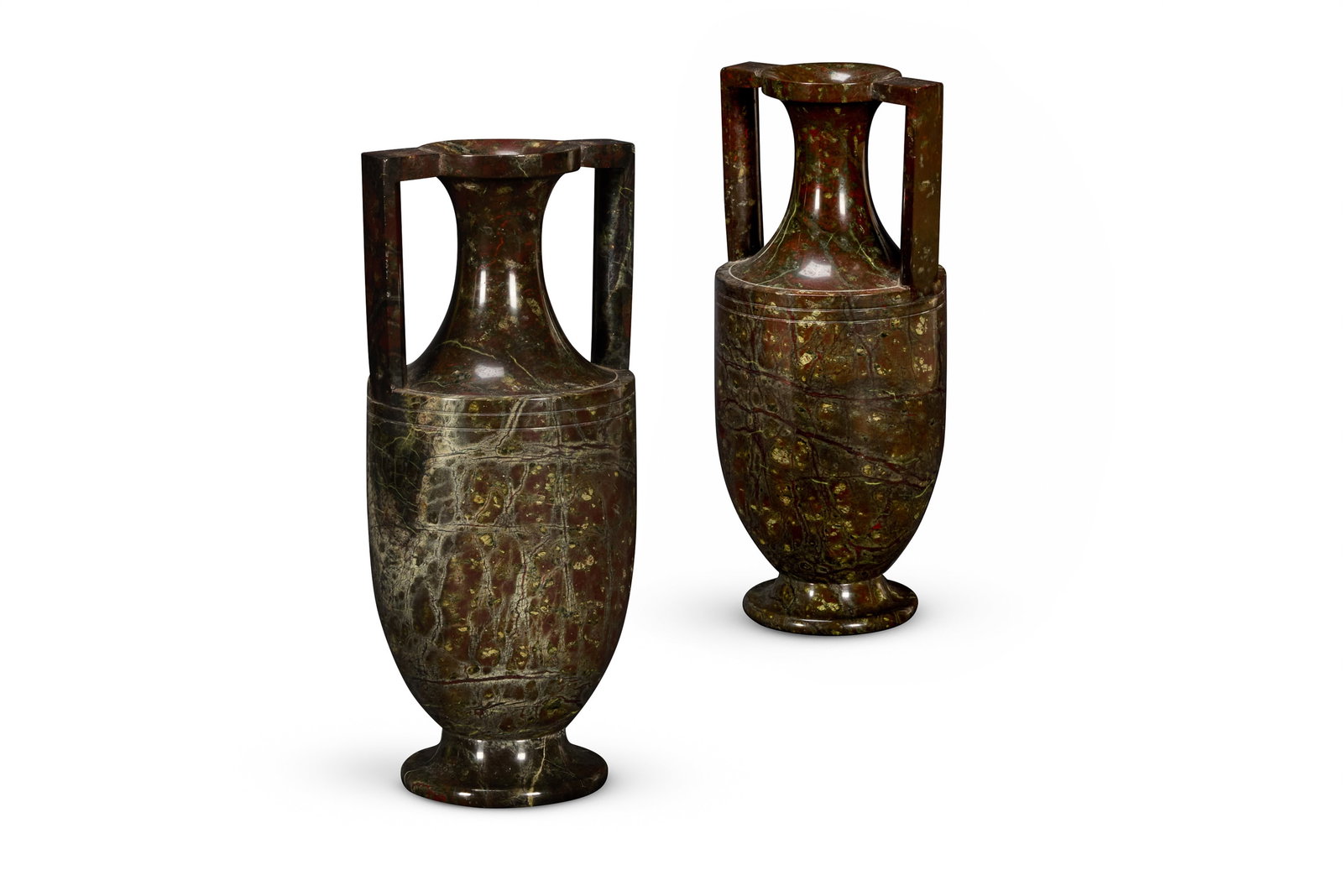 AFTER THE ANTIQUE, A PAIR OF TURNED AND POLISHED CORNISH SERPENTINE URNS: AFTER THE ANTIQUE- A PAIR OF TURNED AND POLISHED CORNISH SERPENTINE URNSIN THE MANNER OF JOHN ORGAN OF PENZANCE, MID 19TH CENTURYOf Grecian amphora form26cm high, base 8cm diameterLiterature:R. Ellis 