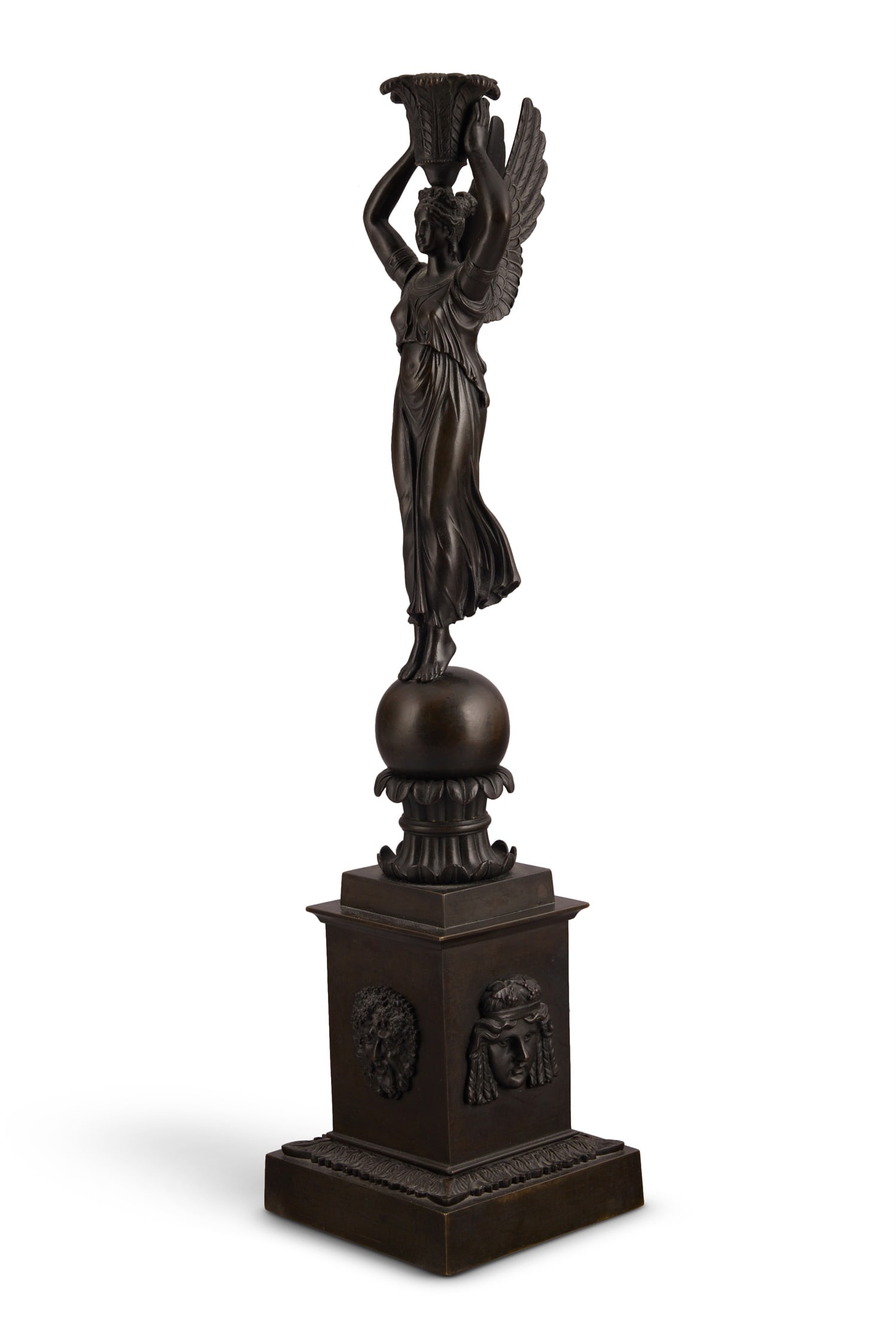 A REGENCY/EMPIRE BRONZE CANDLESTICK À LA VICTOIRE, EARLY 19TH CENTURY, IN THE MANNER OF THOMIRE (1 of 4)