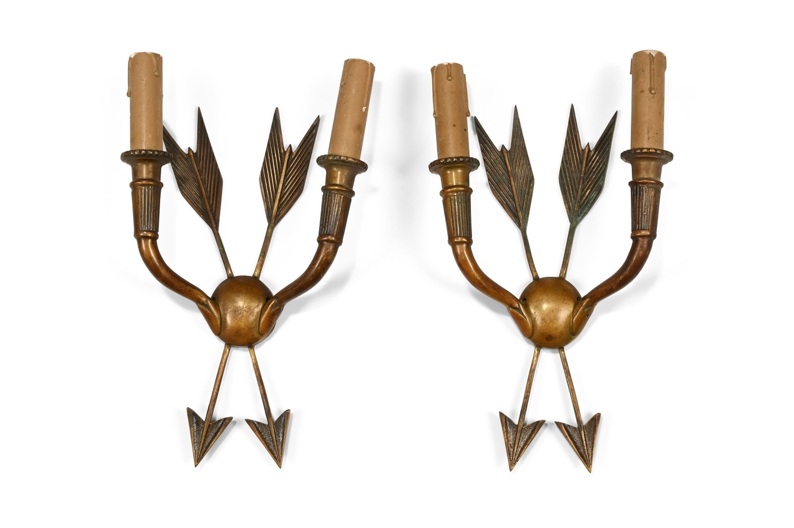 MODERN, PAIR OF ARROW SCONCES, SECOND HALF 20TH CENTURY: MODERNPAIR OF ARROW SCONCES, SECOND HALF 20TH CENTURYBrass, cardboard faux candles 32cm long, 18.5cm wide, 7cm deep 