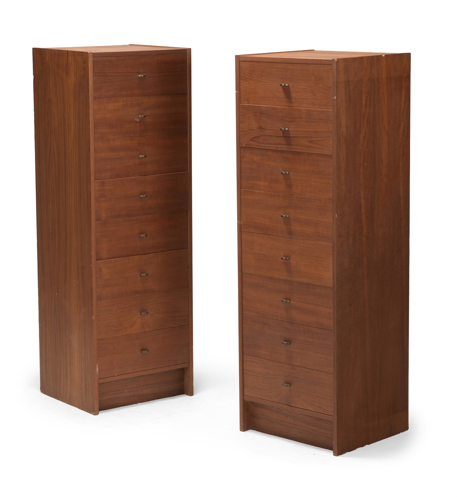 DANISH, TWO TALLBOY DRESSERS, MID 20TH CENTURY: DANISHTWO TALLBOY DRESSERS, MID 20TH CENTURYTeak, brass136cm high, 46cm, 41.5cm deep