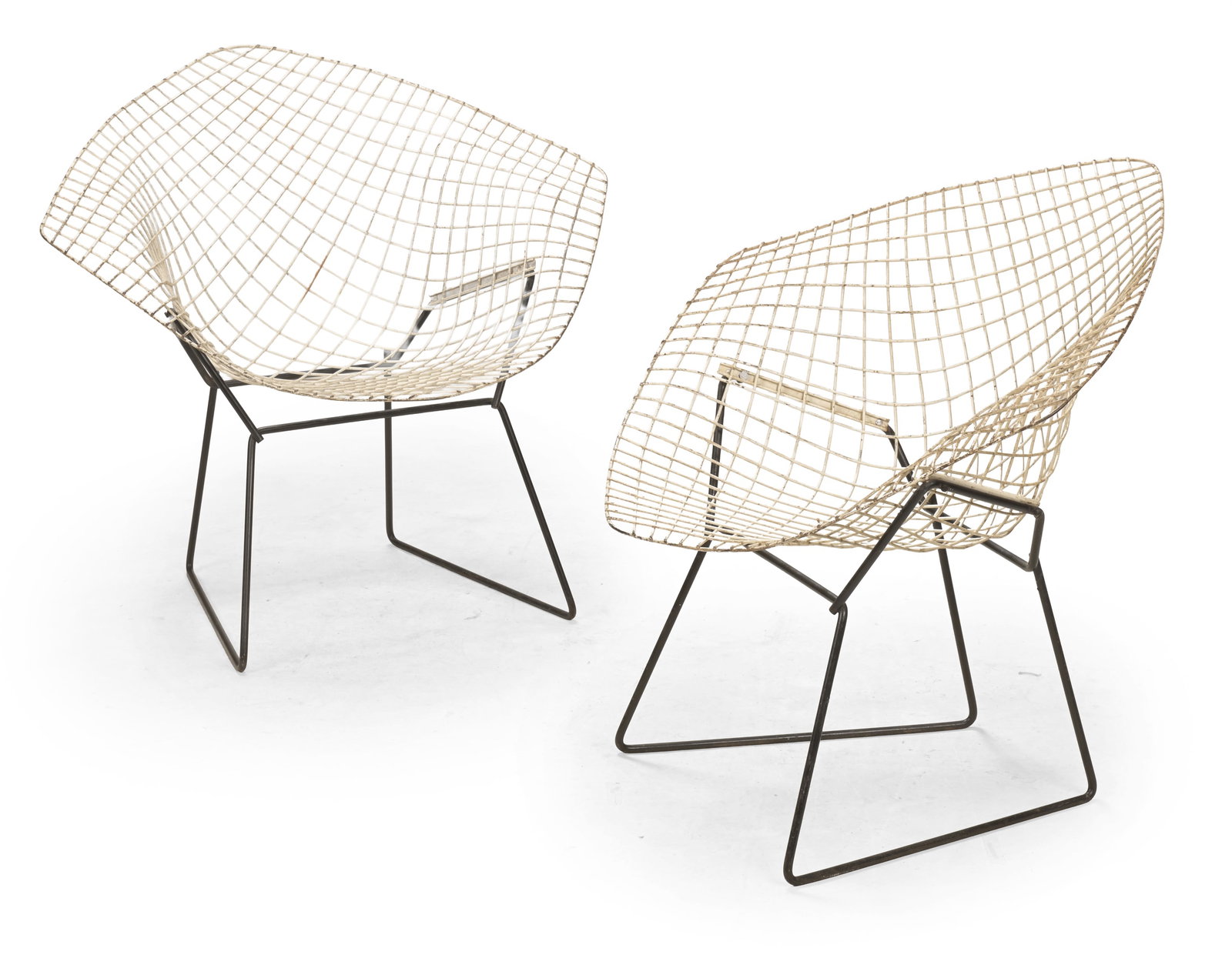 HARRY BERTOIA (ITALIAN, 1915-1978), PAIR OF 'DIAMOND/ MODEL 421' CHAIRS, DESIGNED 1952, CIRCA 1960: HARRY BERTOIA (ITALIAN, 1915-1978)PAIR OF 'DIAMOND/ MODEL 421' CHAIRS, DESIGNED 1952, CIRCA 1960Welded steel rods in white and black, Rilsan plastic coating76cm high, 85cm wide, 50cm deep