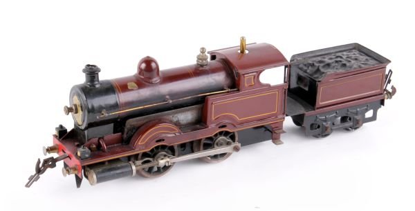 O gauge - A live steam Bassett-Lowke M.R. 0-4-0 te: O gauge - A live steam Bassett-Lowke M.R. 0-4-0 tender locomotive, unnumbered, hand-lined maroon livery, spirit-fired, the cab marked 'British Made' and the tender with 'Lowko' transfer to rear wall,
